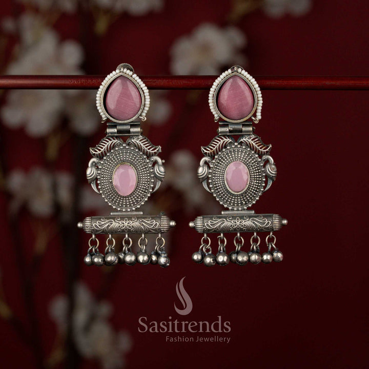 Sasitrends pink oxidised German silver tribal statement earrings featuring a stone stud, teardrop detailing, bird motif centerpiece and architectural rectangular frame, perfect for sarees and traditional kurtis.