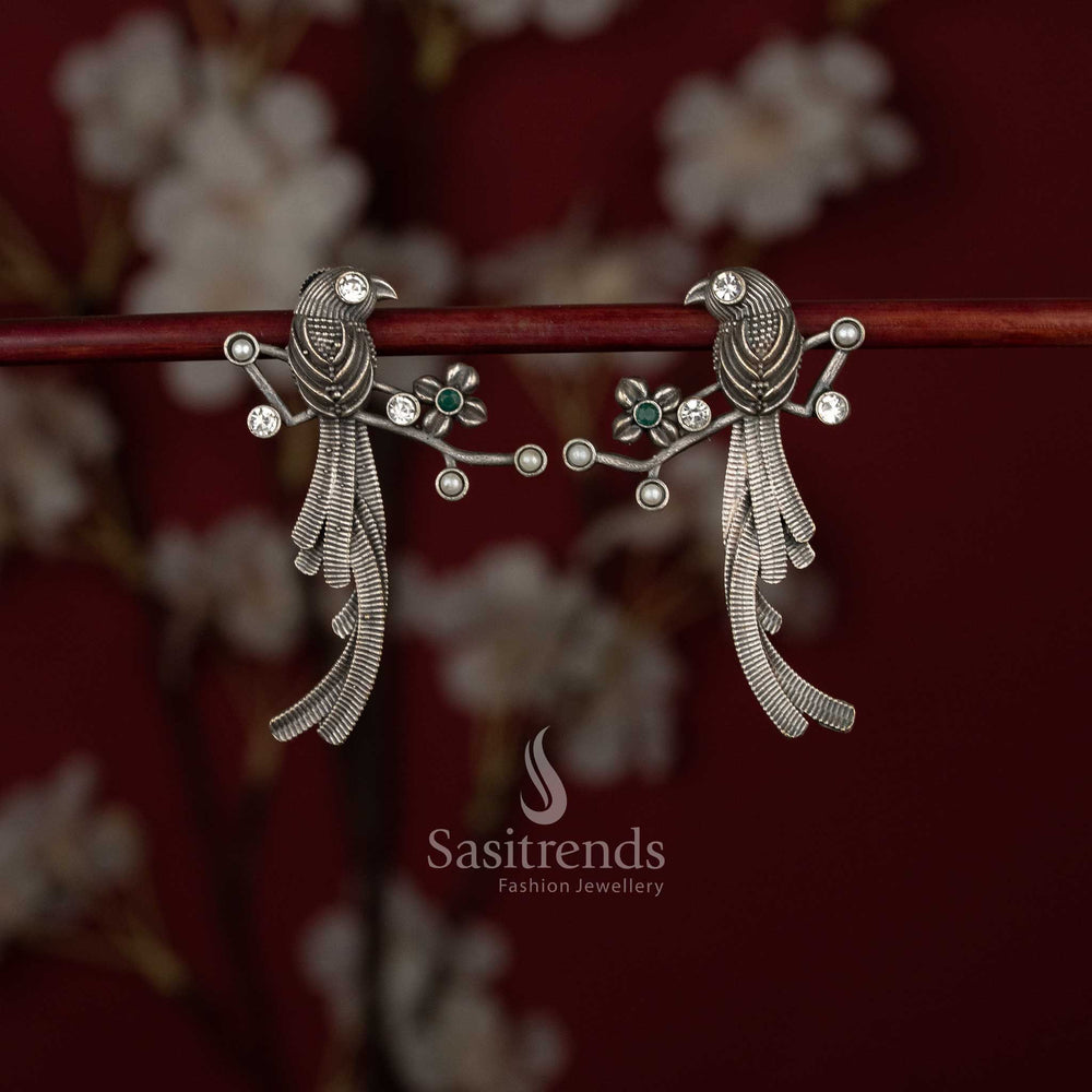 Sasitrends oxidised German silver stone earrings featuring twin bird motif and feathered drop design