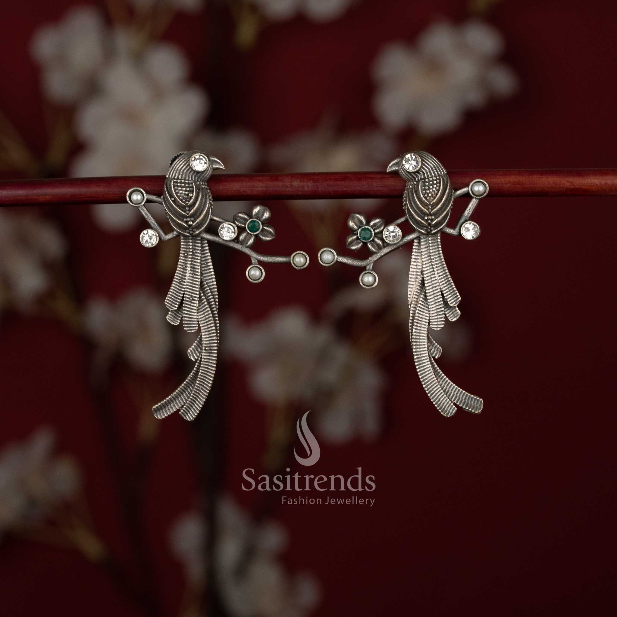 Sasitrends oxidised German silver stone earrings featuring twin bird motif and feathered drop design