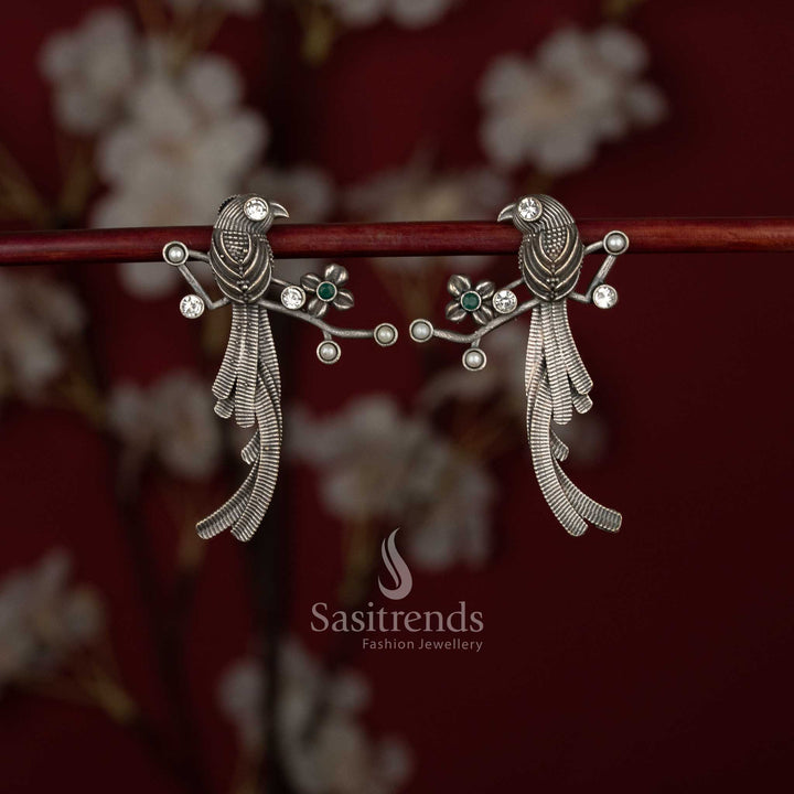Sasitrends oxidised German silver stone earrings featuring twin bird motif and feathered drop design