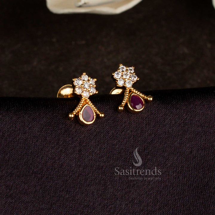 Sasitrends micro gold plated floral stud earrings with white ruby American diamond stones and teardrop drop design