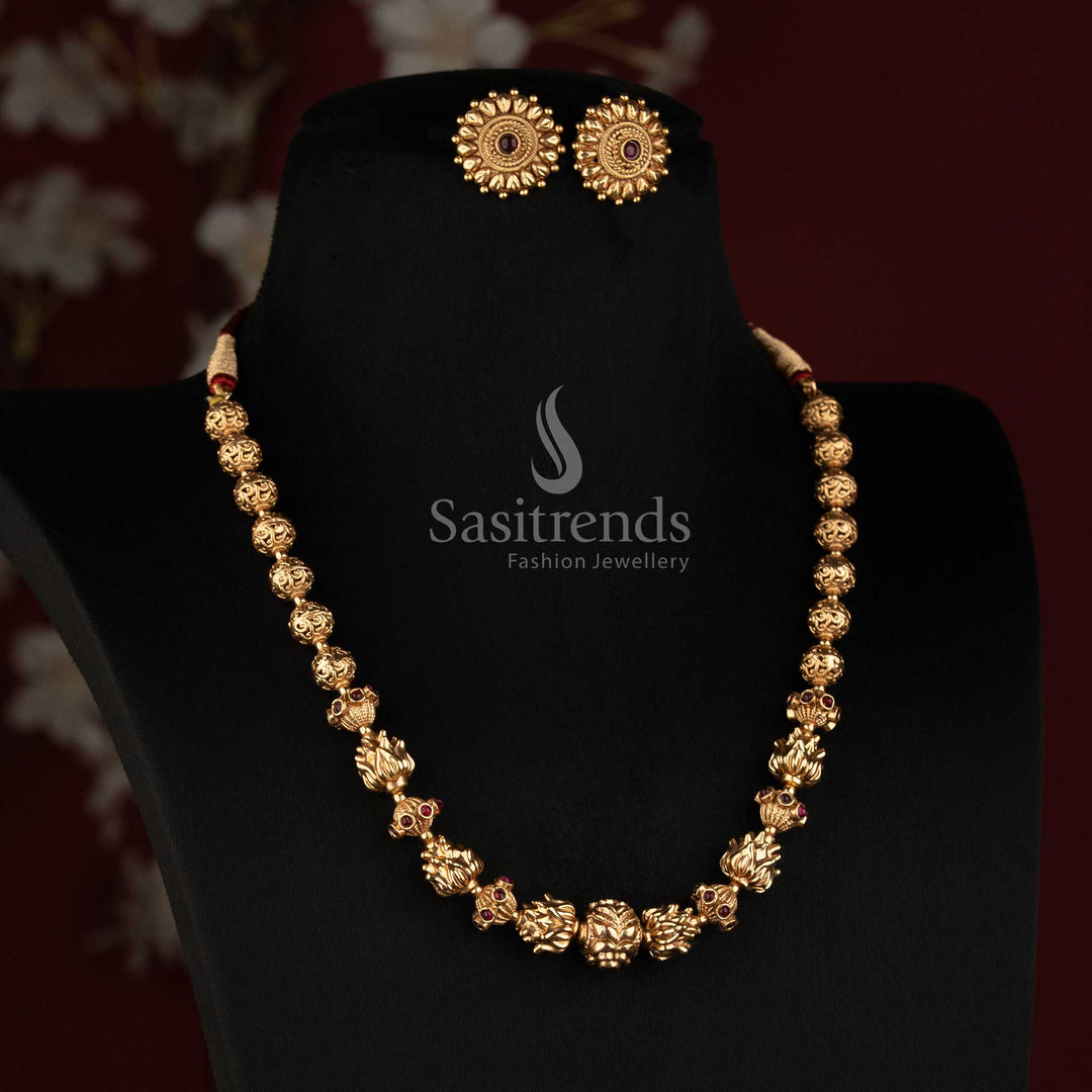 Sasitrends antique gold plated temple jewellery necklace featuring detailed lotus floral motifs and stone work 