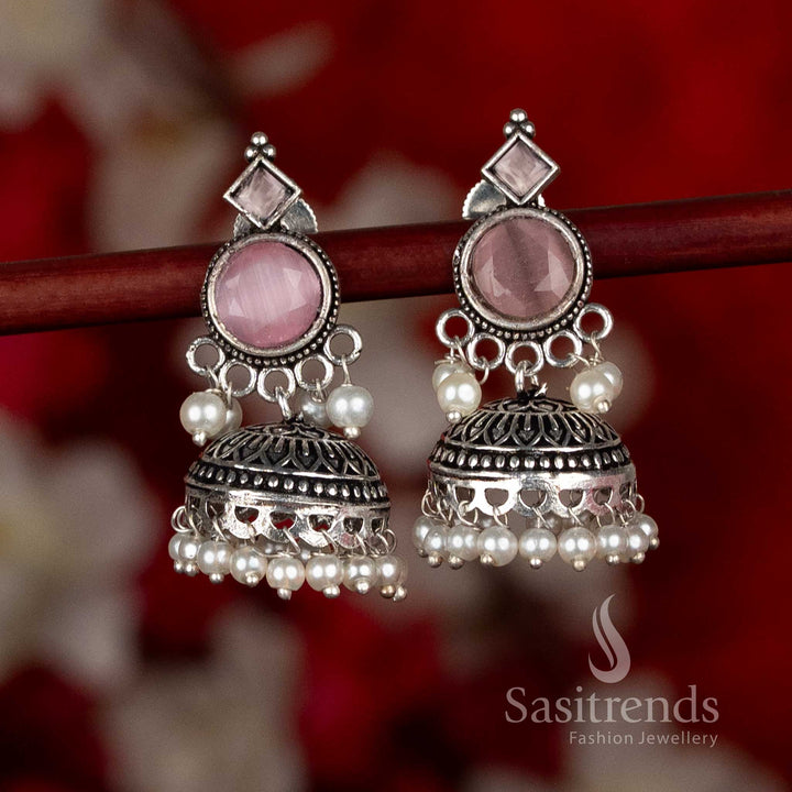 Sasitrends oxidised silver plated jhumka earrings designed with circular stud tops, structured dome jhumka form, and pearl bead detailing in a pink color variant, suitable for ethnic wear, casual wear, office wear, and modern saree ensembles
