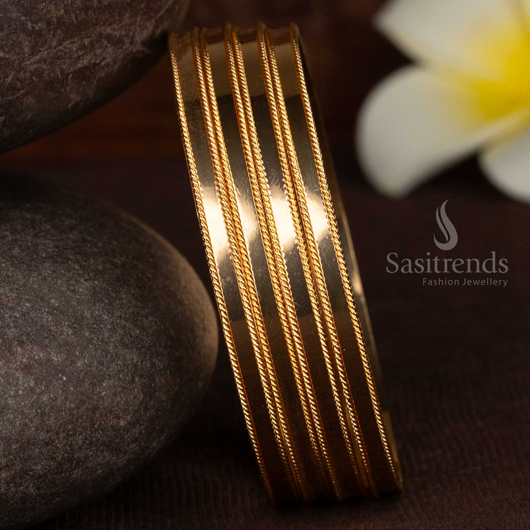 Sasitrends micro gold plated traditional bangle with rope line panel design and ad stone free gold finish