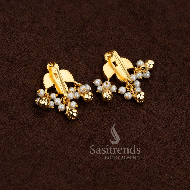 Sasitrends 24k jadau gold plated kundan kundan stone bugadi ear cuff earrings styled in classic floral design structure with pearl drop detailing ideal for wedding and festive styling
