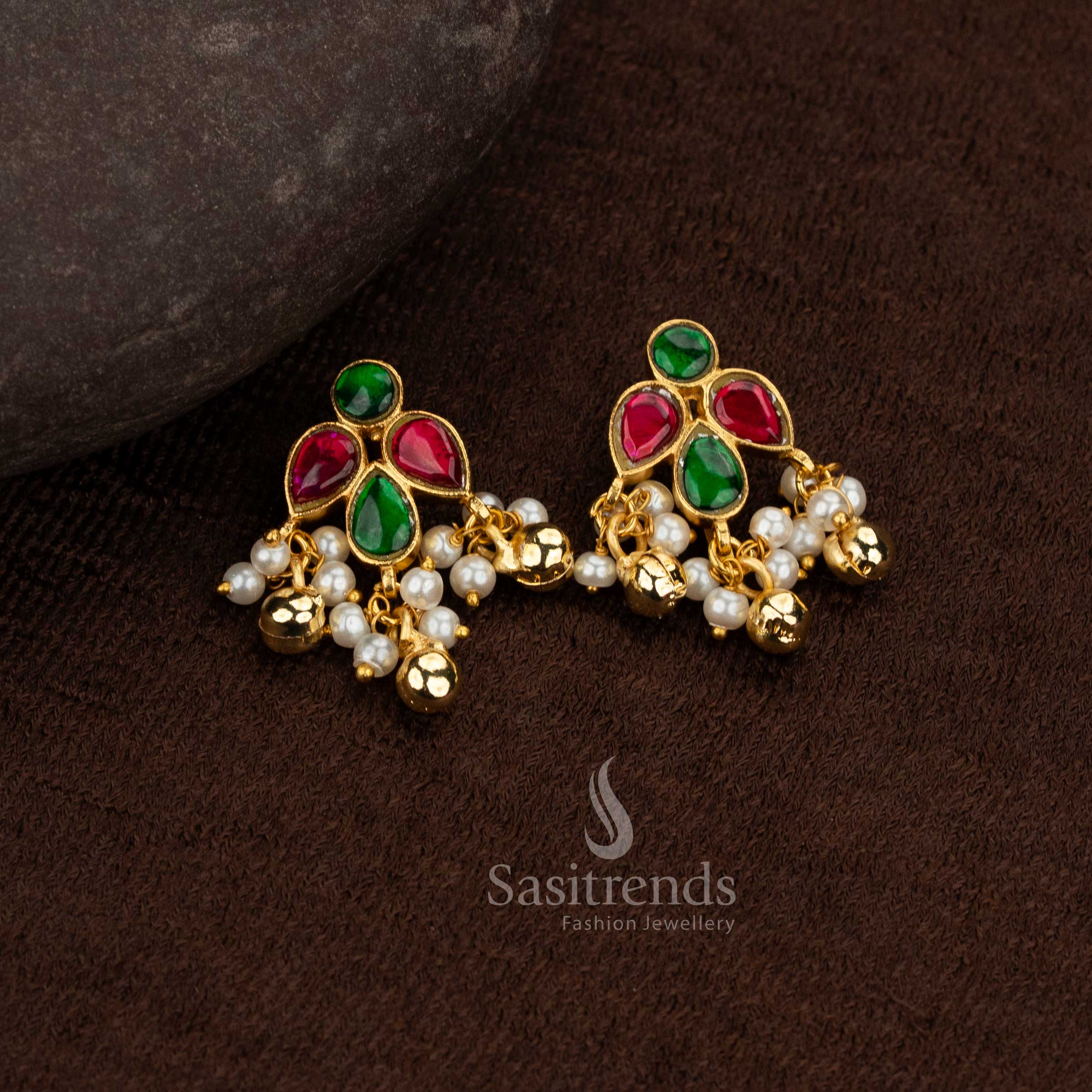 Sasitrends 24k jadau gold plated ruby green kundan stone bugadi ear cuff earrings crafted in floral and leaf design structure with pearl hanging details for premium rich traditional wedding and festive wear
