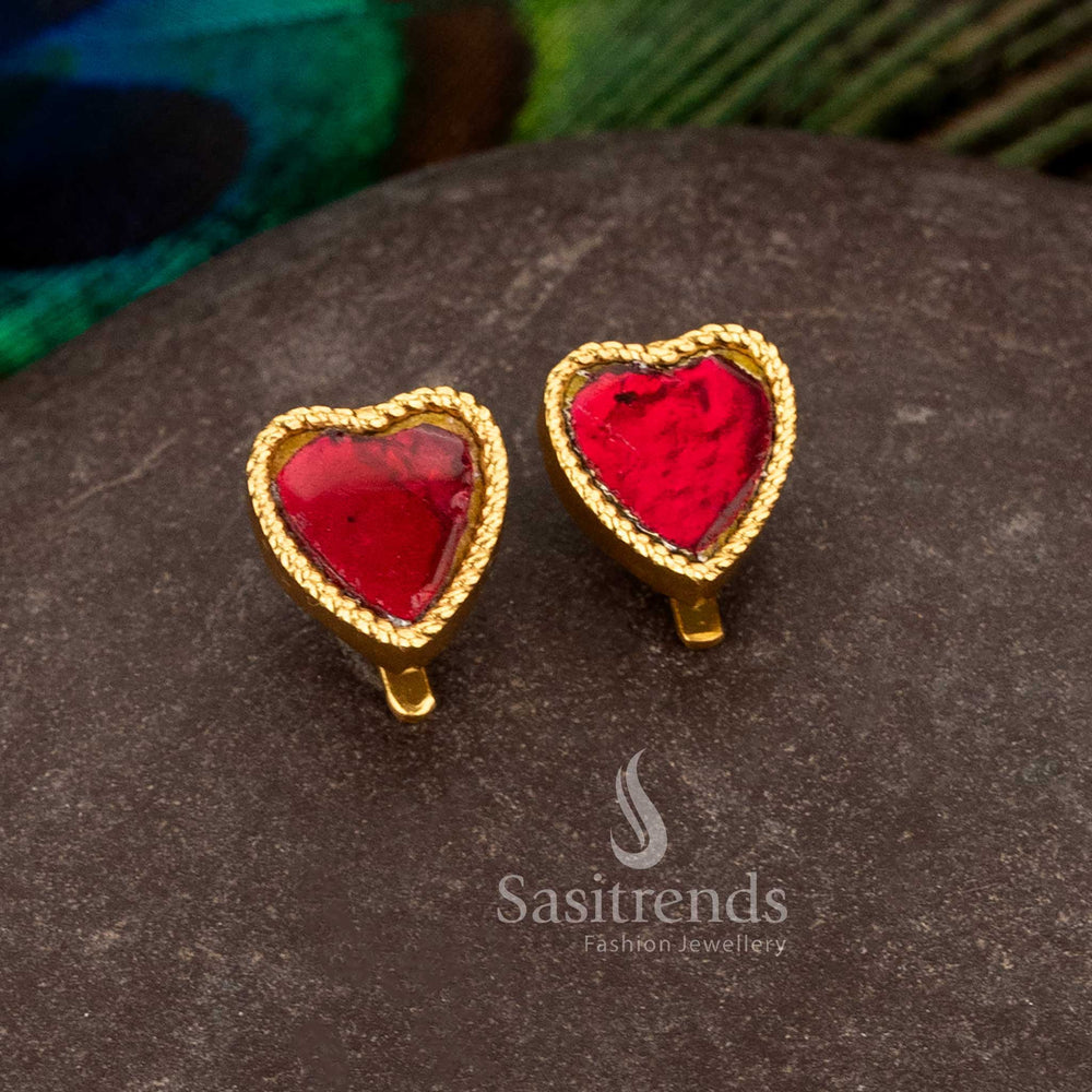 Sasitrends 24k jadau gold plated red heart stone bugadi stud earrings featuring rich traditional structure ideal for bridal and festive occasions