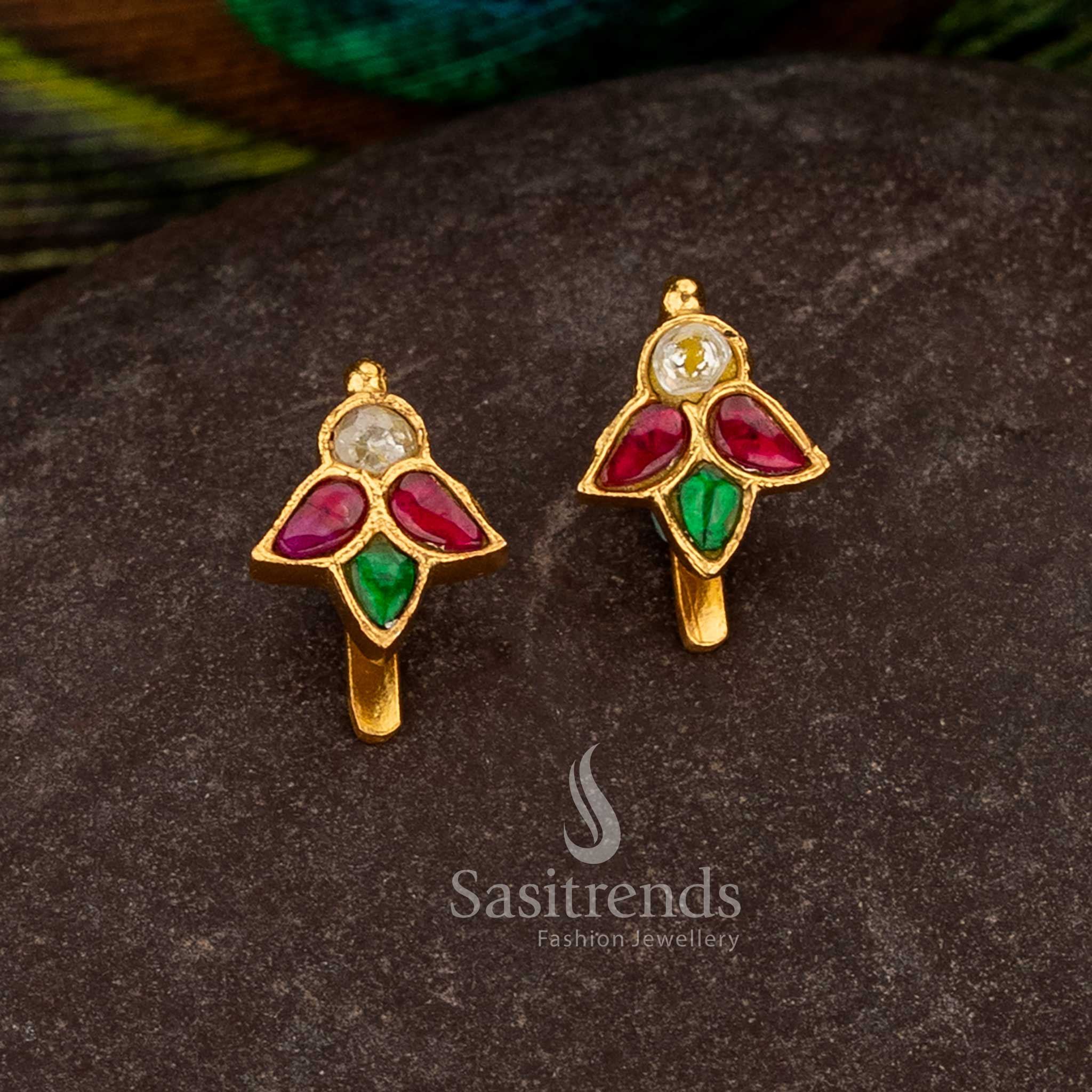 Sasitrends 24k jadau gold plated ruby white and green kundan stone bugadi earrings with traditional leaf motif design structure for wedding and festive occasions
