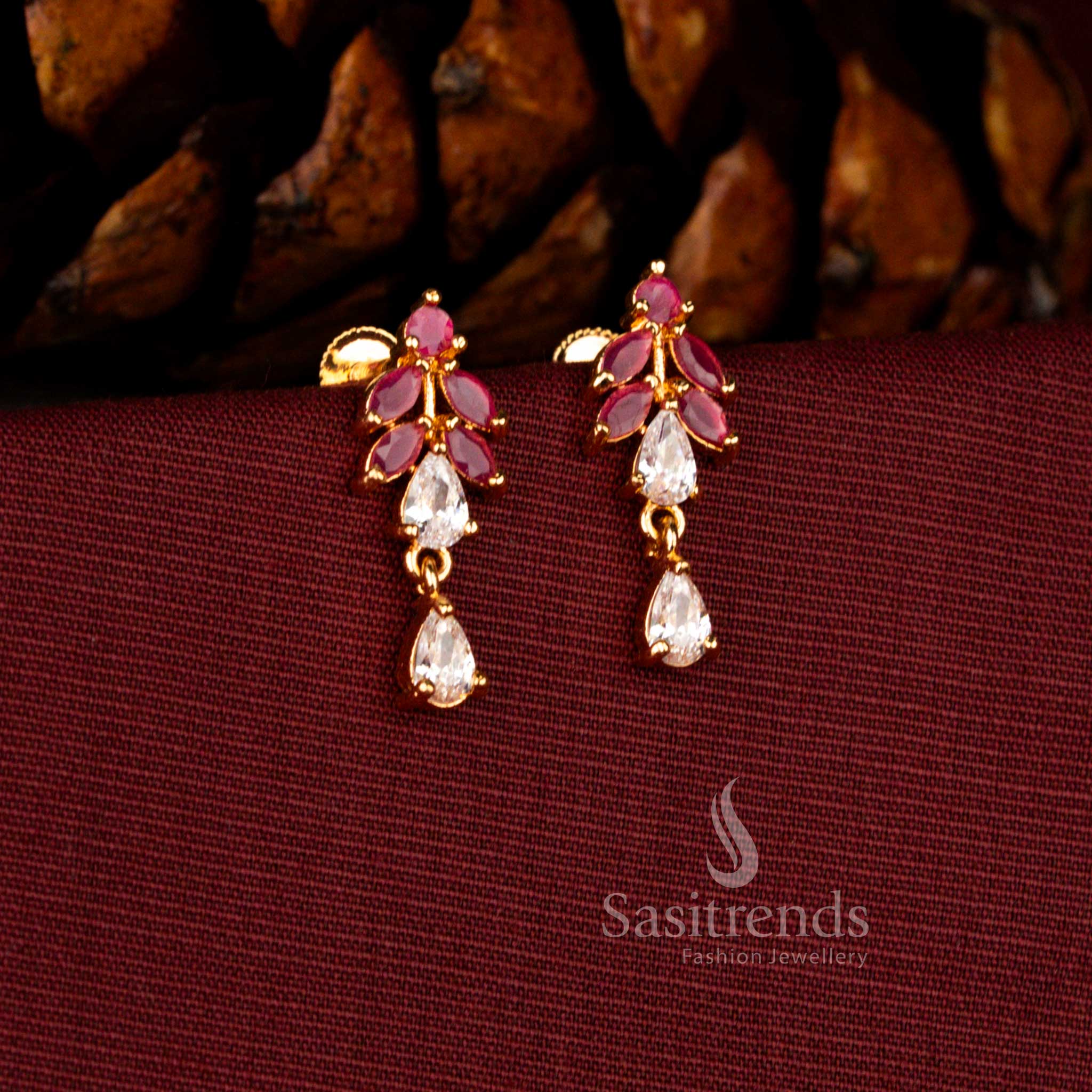 Sasitrends 24K micro gold plated leaf cascade white ruby AD dangler earrings designed for weddings and festive occasions
