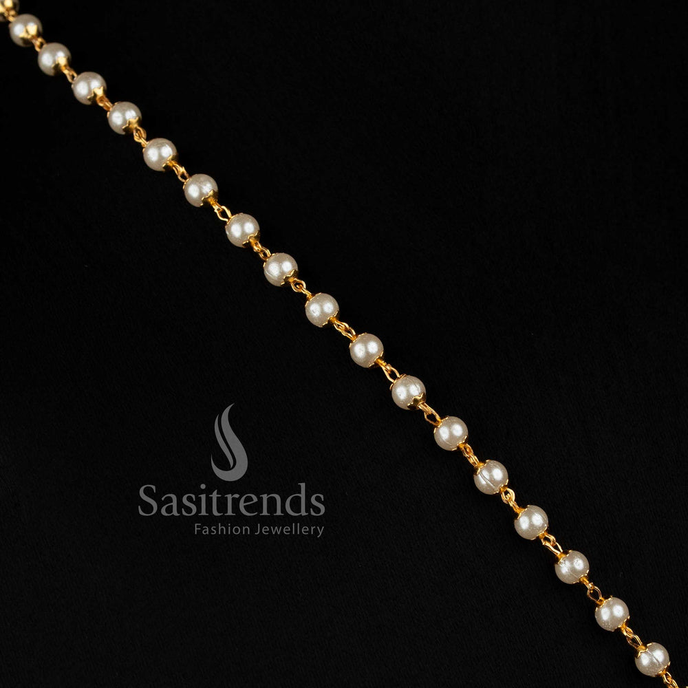 Elegant women’s long micro gold plated necklace with a slender beaded chain structure, detailed central floral pendant and AD stone embellishments for saree and festive styling