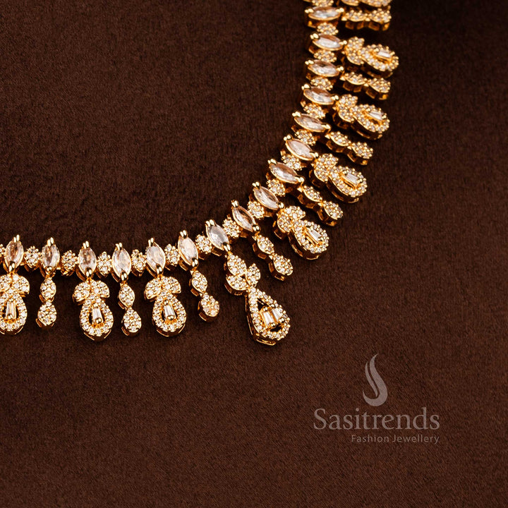 Sasitrends micro gold plated necklace set with pear-shaped white American diamond drop design, central elongated teardrop motif, and matching earrings bracelet ring