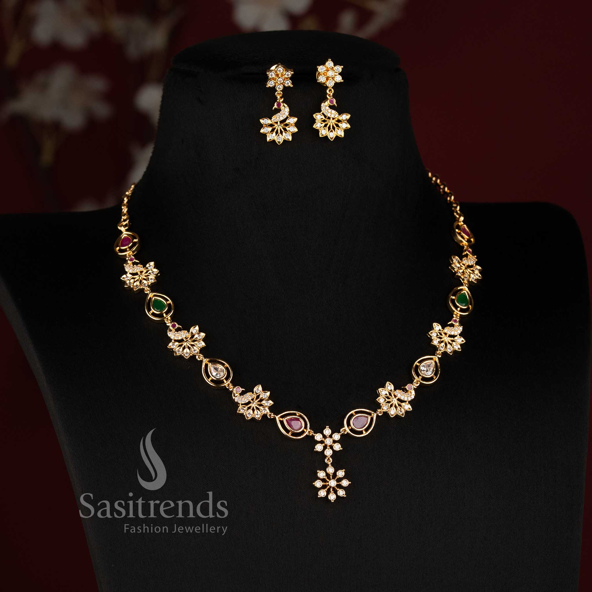 Sasitrends Pachaloha Impon Addigai jewellery set featuring connected floral motifs, ornamental pear-shaped sections and coordinated drop earrings 