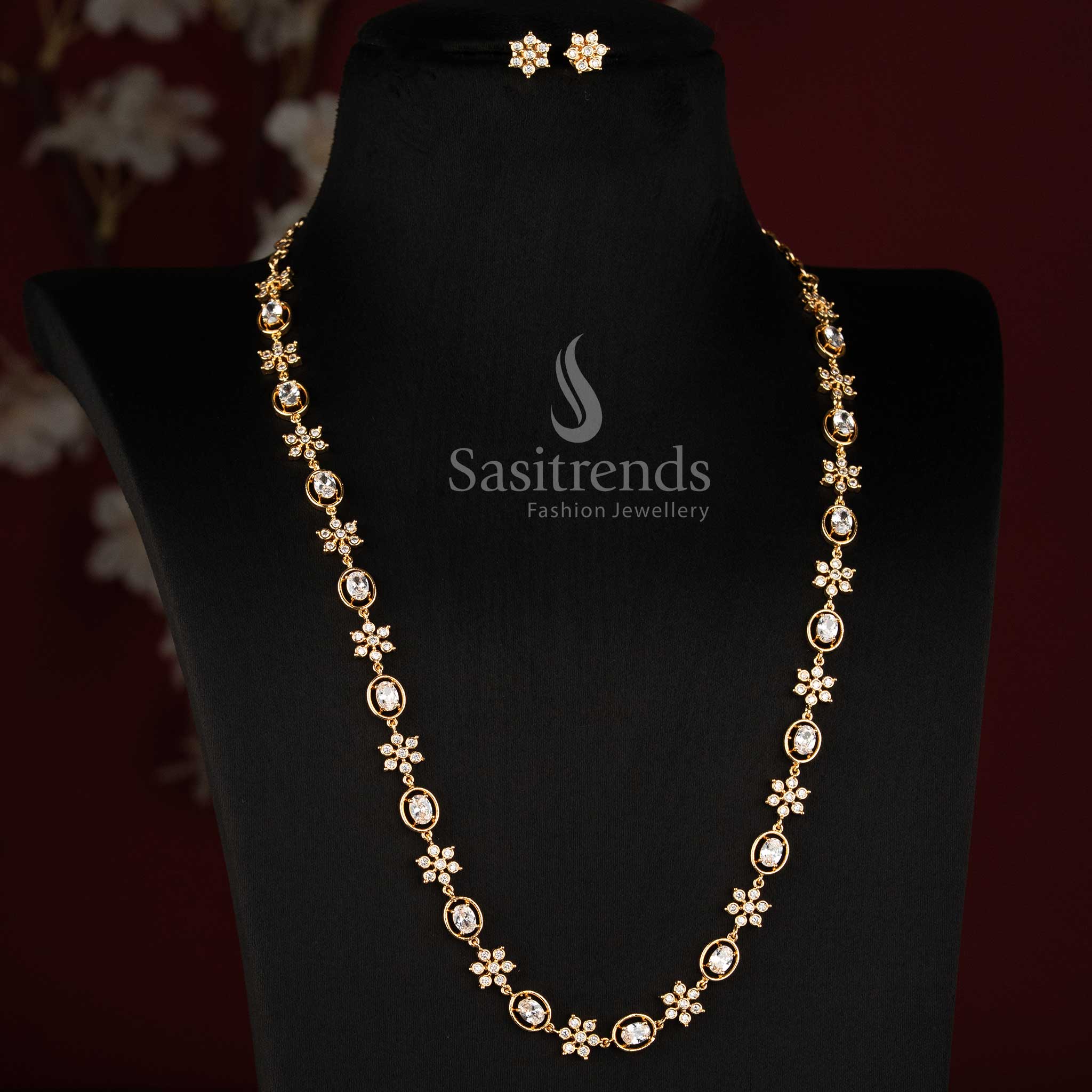 Sasitrends 24K pure gold plated Impon Addigai short and long necklace showcasing floral AD stone detailing and matching stud earrings 