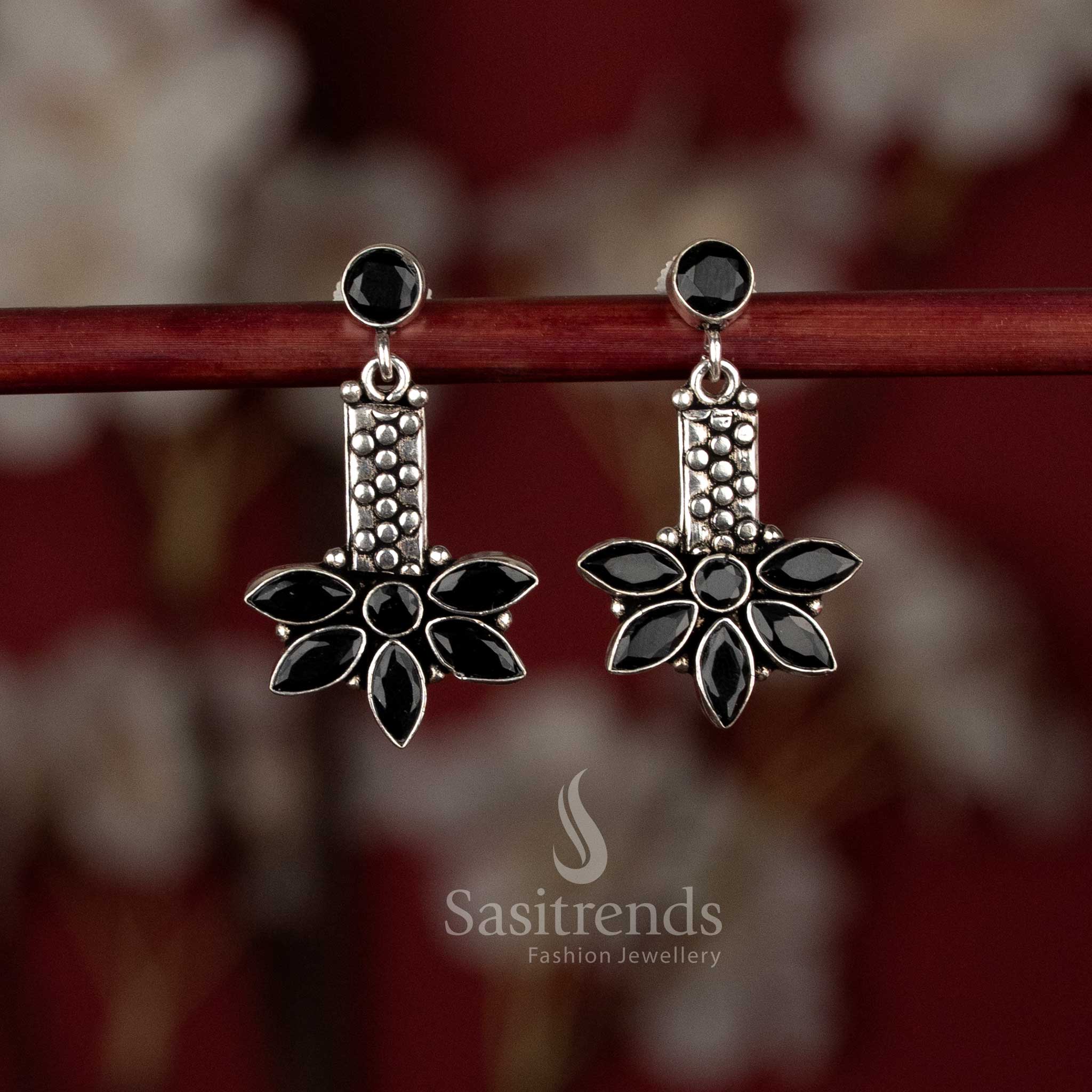 Sasitrends expressive oxidised silver plated black earrings featuring structured form and soft floral elements