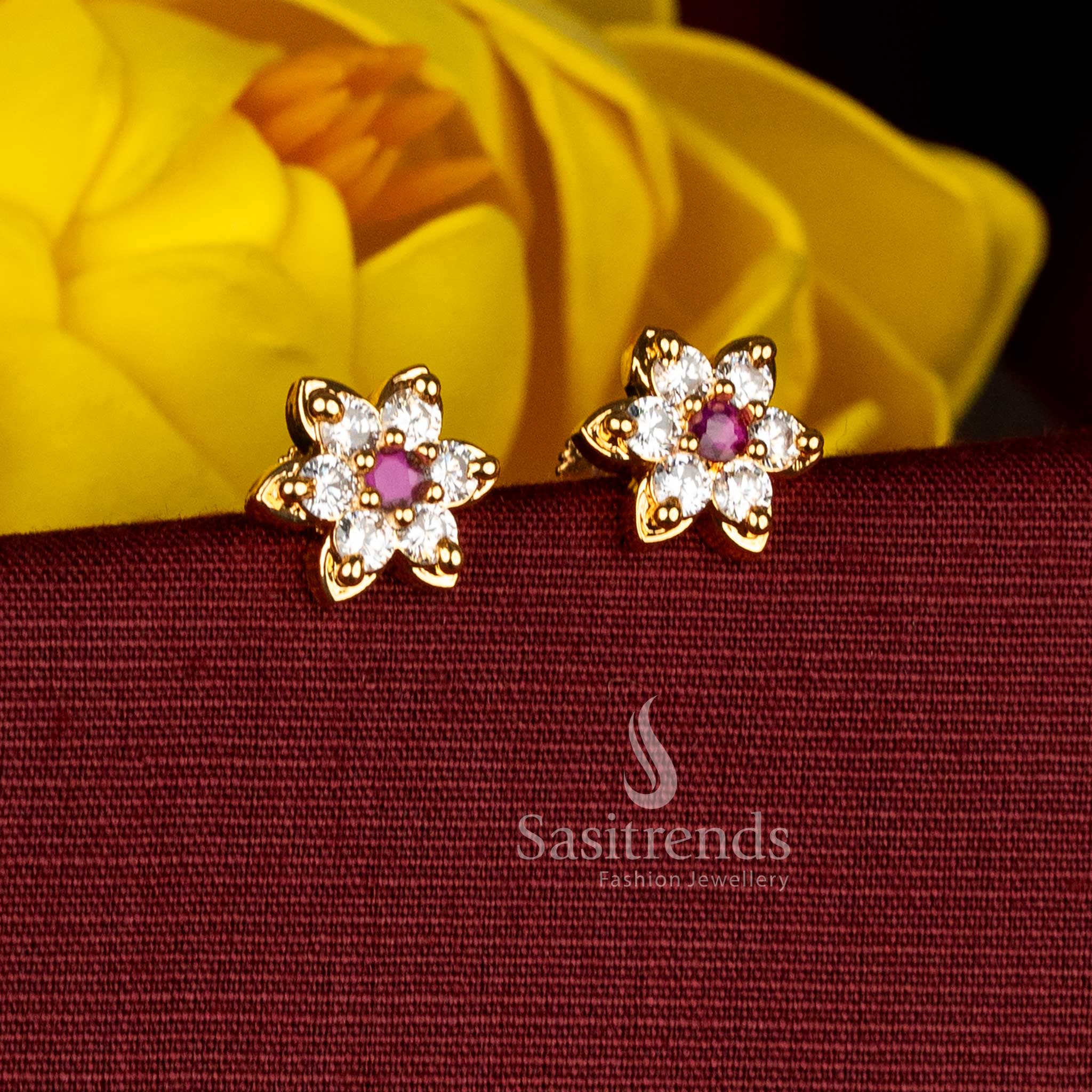 Sasitrends floral motif micro gold plated white ruby AD stone stud earrings showcasing layered structure with smooth real gold–like finish