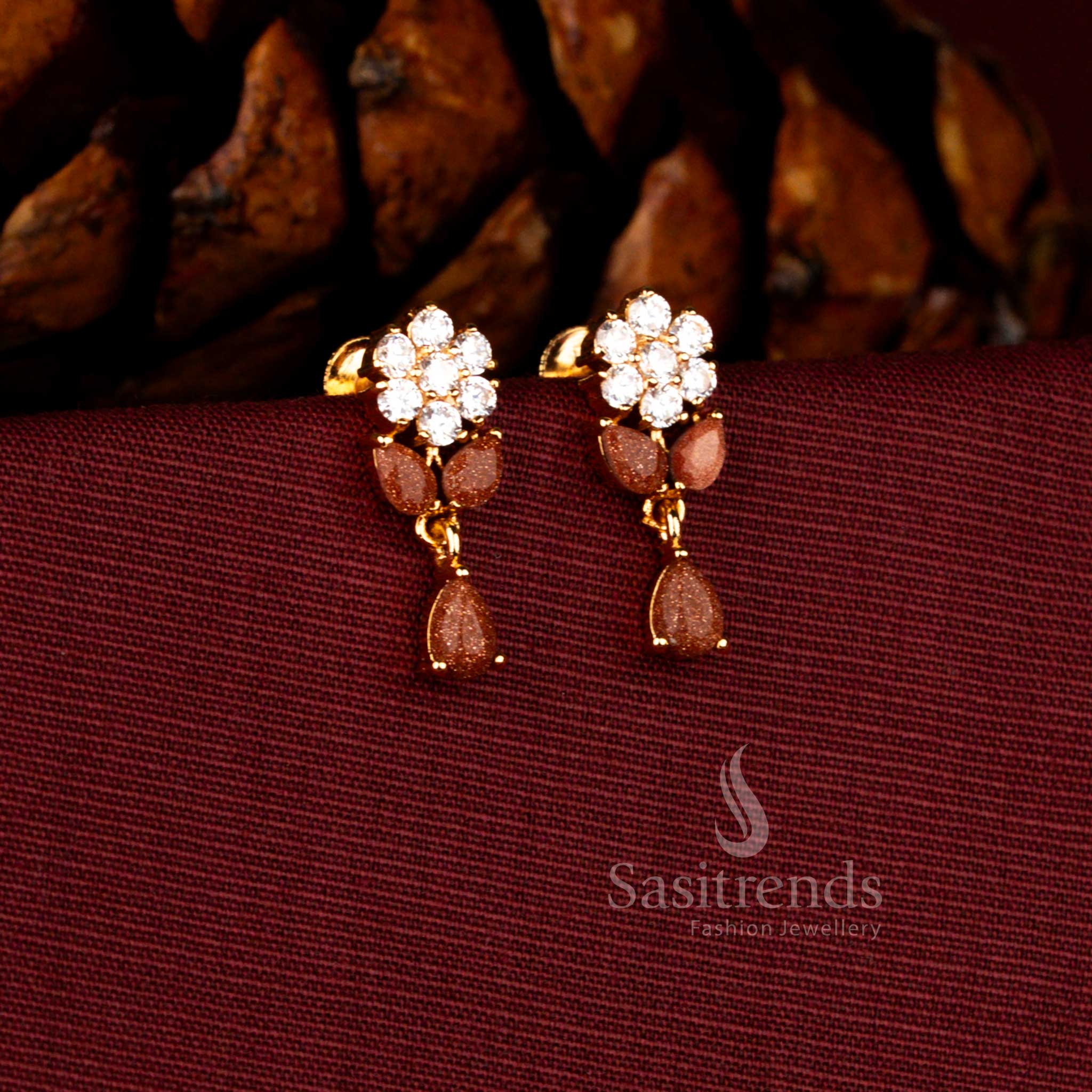 Sasitrends micro gold plated pearl floral cluster dangler earrings designed with a shimmering teardrop white brown AD stone stud and premium 1 gram jewellery finish that delivers a guaranteed real gold look for weddings.