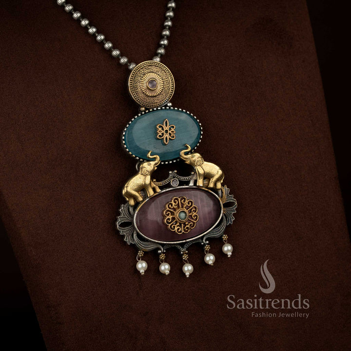 Sasitrends antique oxidised silver plated necklace jewellery set with a vertical panel pendant design featuring embossed medallion, floral Monalisa detailing, elephant motifs, pearl danglers and matching earrings – pink mint dual colour variant

