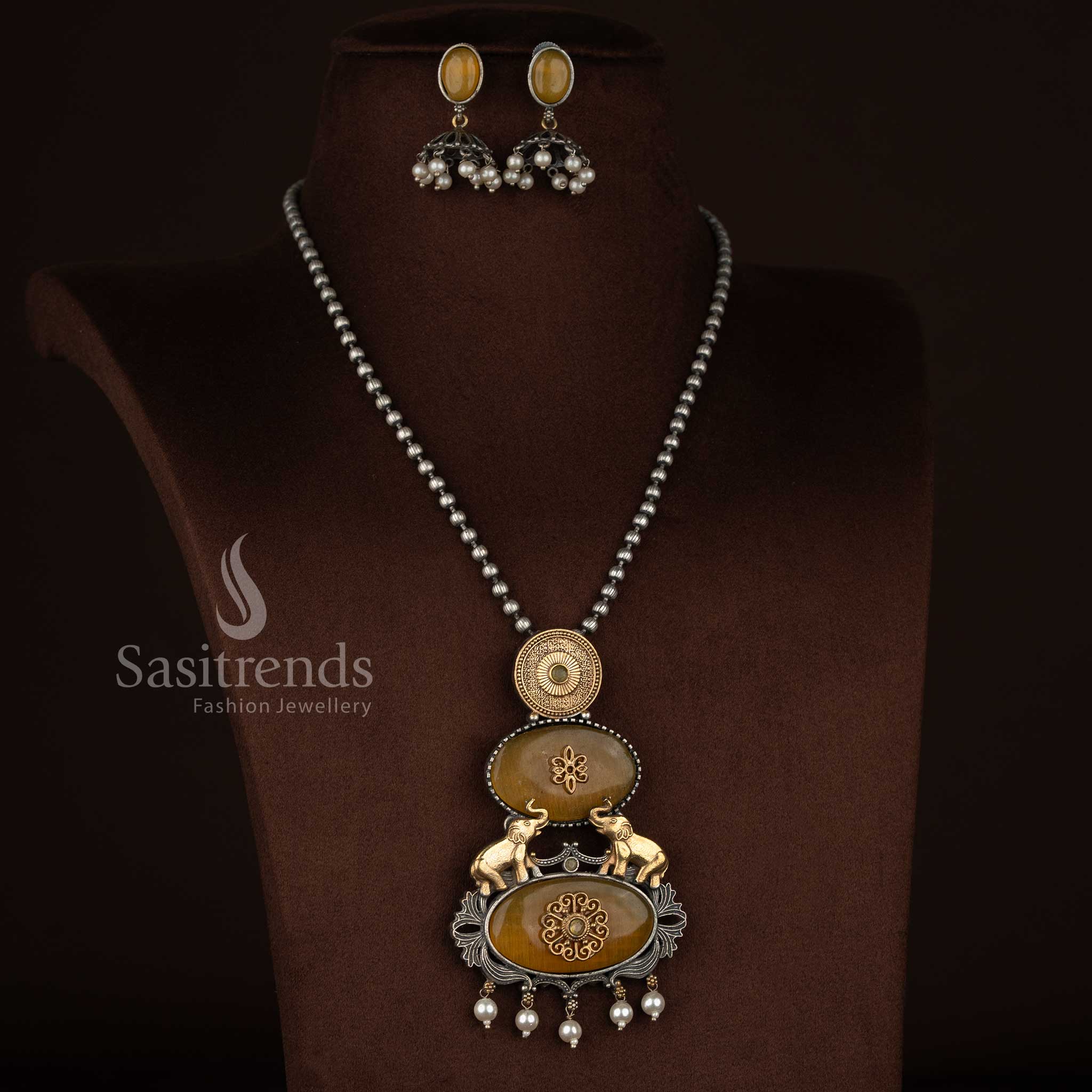 Sasitrends antique oxidised silver plated necklace jewellery set with structured vertical pendant design, embossed top medallion, floral Monalisa centre, elephant motif detailing, pearl bead danglers and matching earrings – yellow shade
