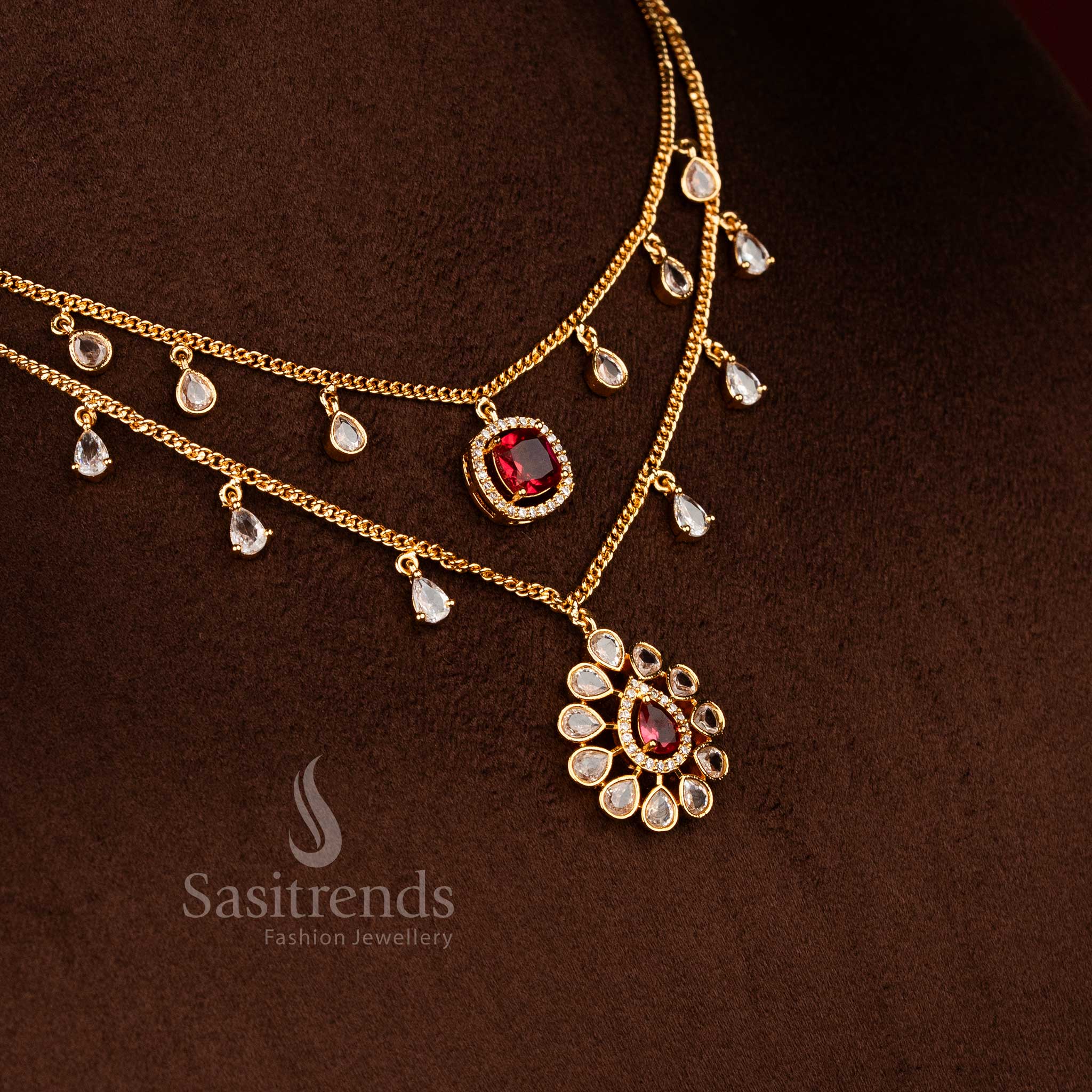 24K micro gold plated necklace set with double layer chain structure, teardrop motif white red American diamond detailing, and coordinated earrings - Sasitrends