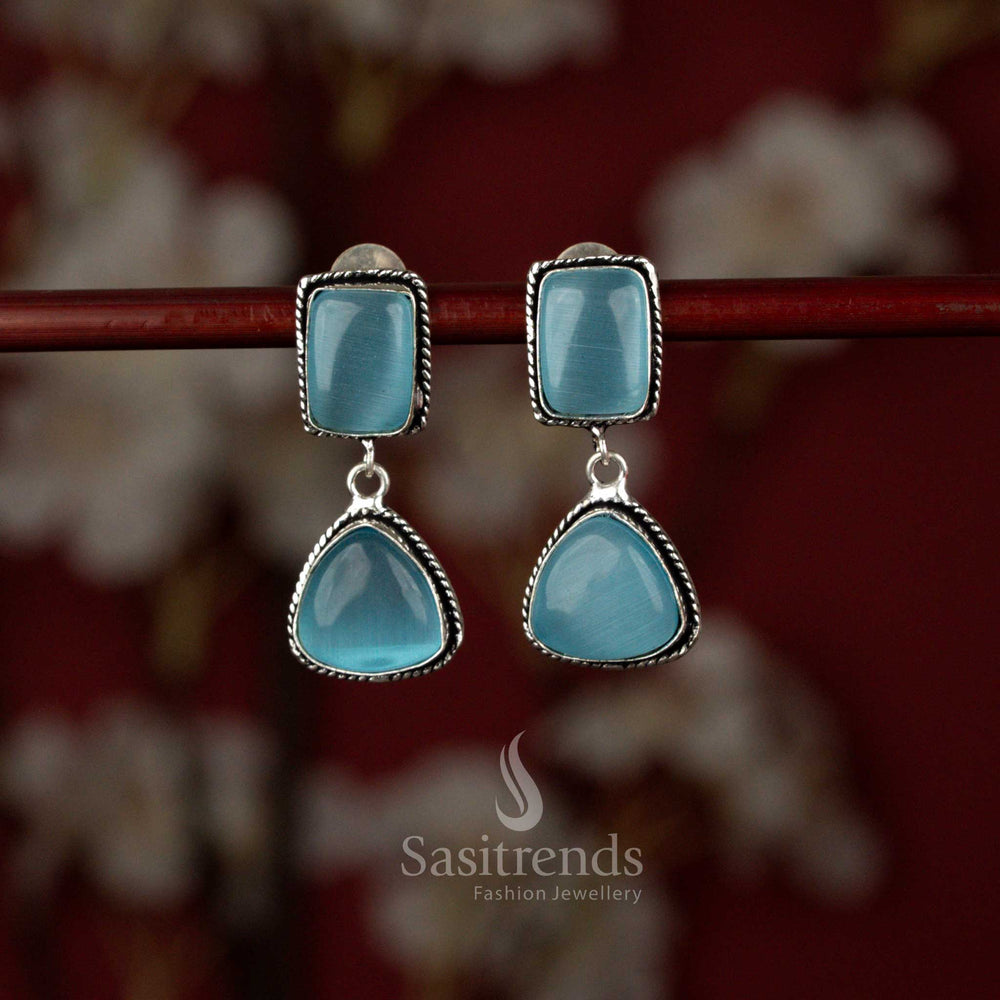 Sasitrends elegant oxidised ocean blue Monalisa stone dangler earrings crafted in a two-tier geometric design featuring a square top, triangular drop and subtle pearl accents, perfect for casual meetups and everyday ethnic styling.