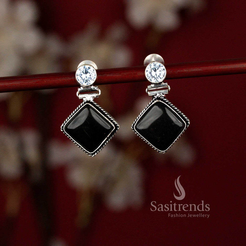 Sasitrends charming black oxidised Monalisa stone eye rhombus drop earrings designed with a unique diamond-shaped frame and glossy center stone, perfect for office wear, casual outings and subtle semi-ethnic styling.