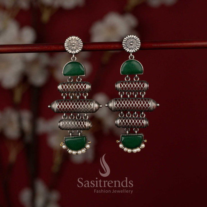 Sasitrends multi-layered oxidised silver earrings featuring a stacked cylindrical barrel design accented with green stone panel highlights and finished with elegant pearl drops, ideal for festive gatherings and traditional events.