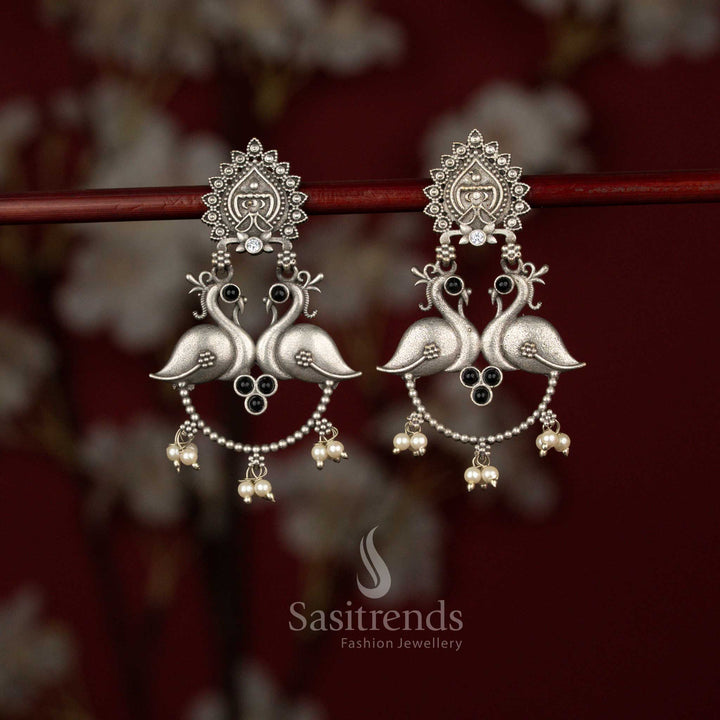Elegant Antique Oxidised Silver Plated Peacock Motif Drop Earrings with Temple Inspired Stud, Curved Beaded Chain and Pearl Hangings