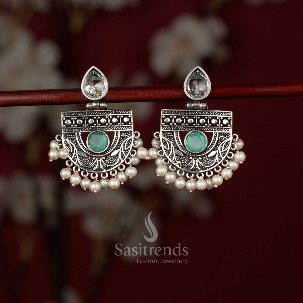 Sasitrends mint oxidised silver chandbali earrings designed with a graceful pear-shaped stone centerpiece, intricate crescent detailing and delicate pearl hangings, perfect for sarees, kurtis and festive celebrations.