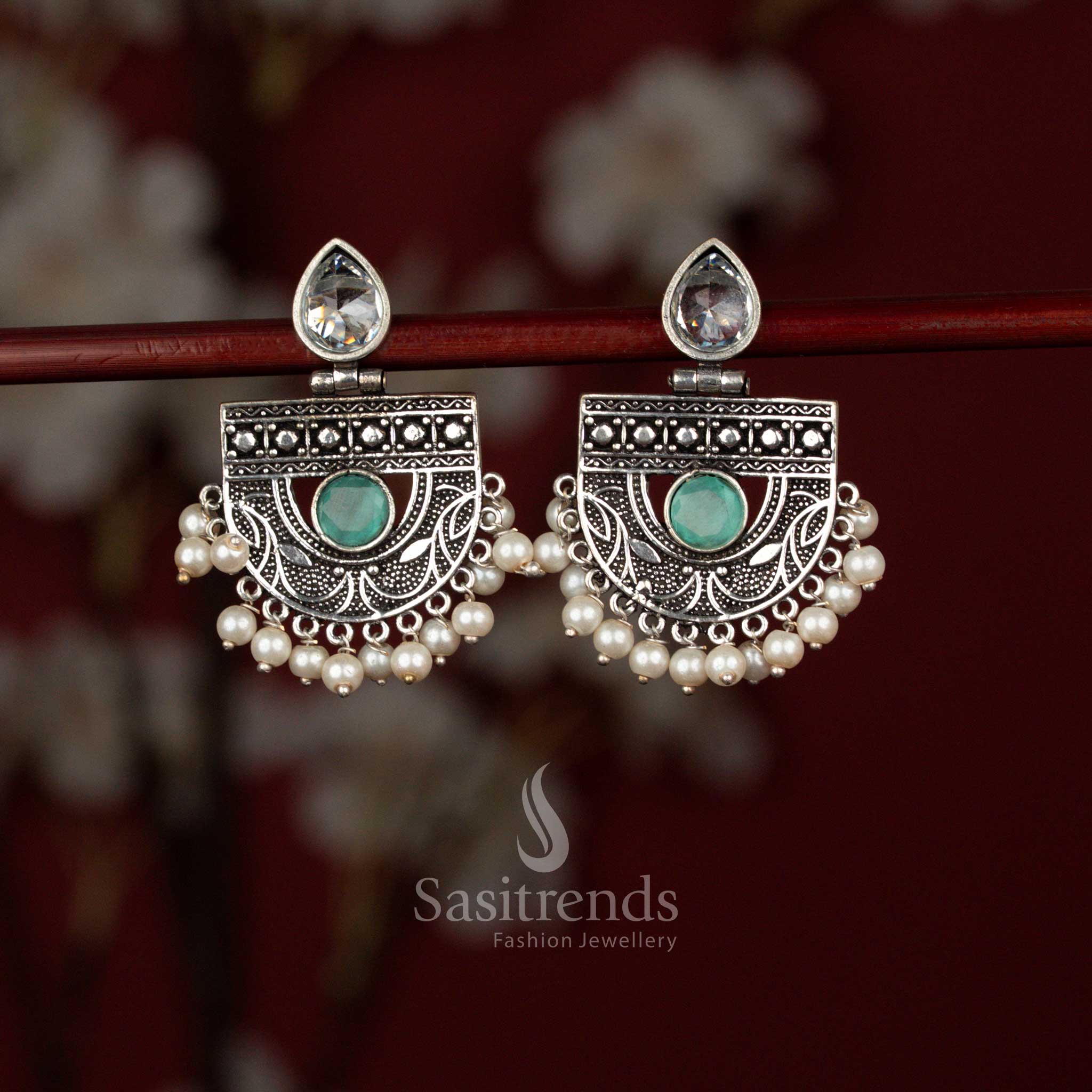 Sasitrends mint oxidised silver chandbali earrings designed with a graceful pear-shaped stone centerpiece, intricate crescent detailing and delicate pearl hangings, perfect for sarees, kurtis and festive celebrations.