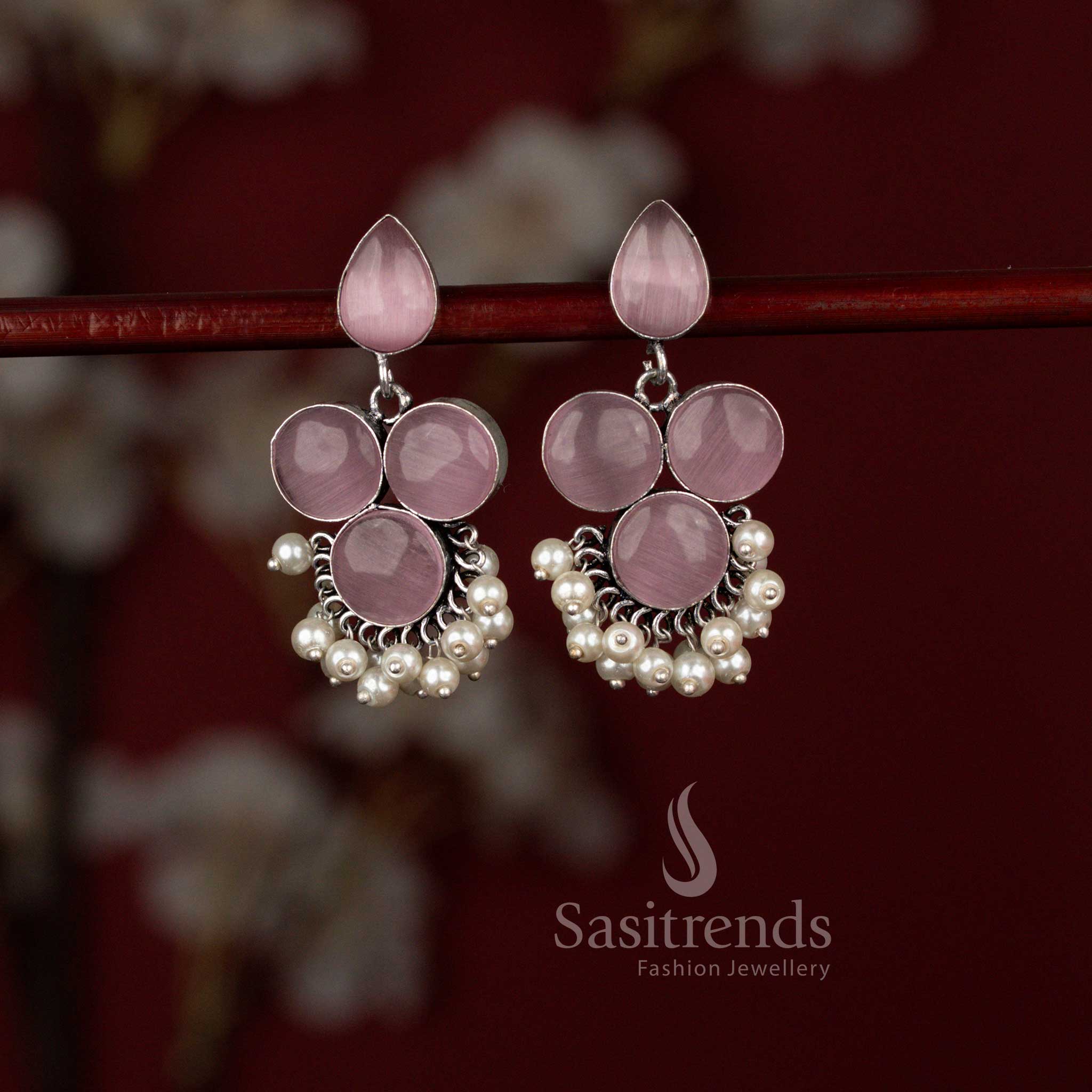 Sasitrends antique pink oxidised silver earrings designed with a polished round Monalisa stone stud connected to a teardrop frame and finished with soft pearl drops, perfect for kurtis, office meetups and subtle ethnic styling.