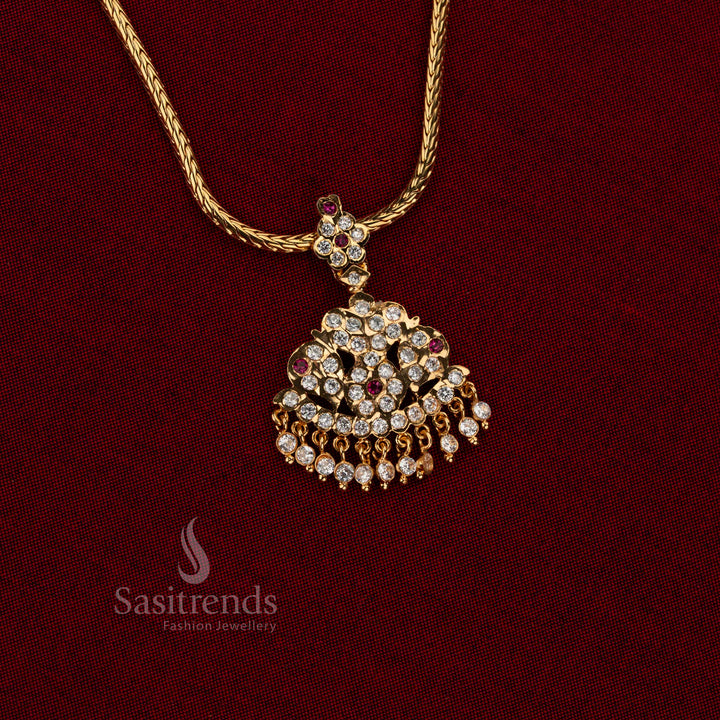 Micro gold plated white ruby AD stone Impon Attigai jewellery from Sasitrends with traditional curved pendant structure