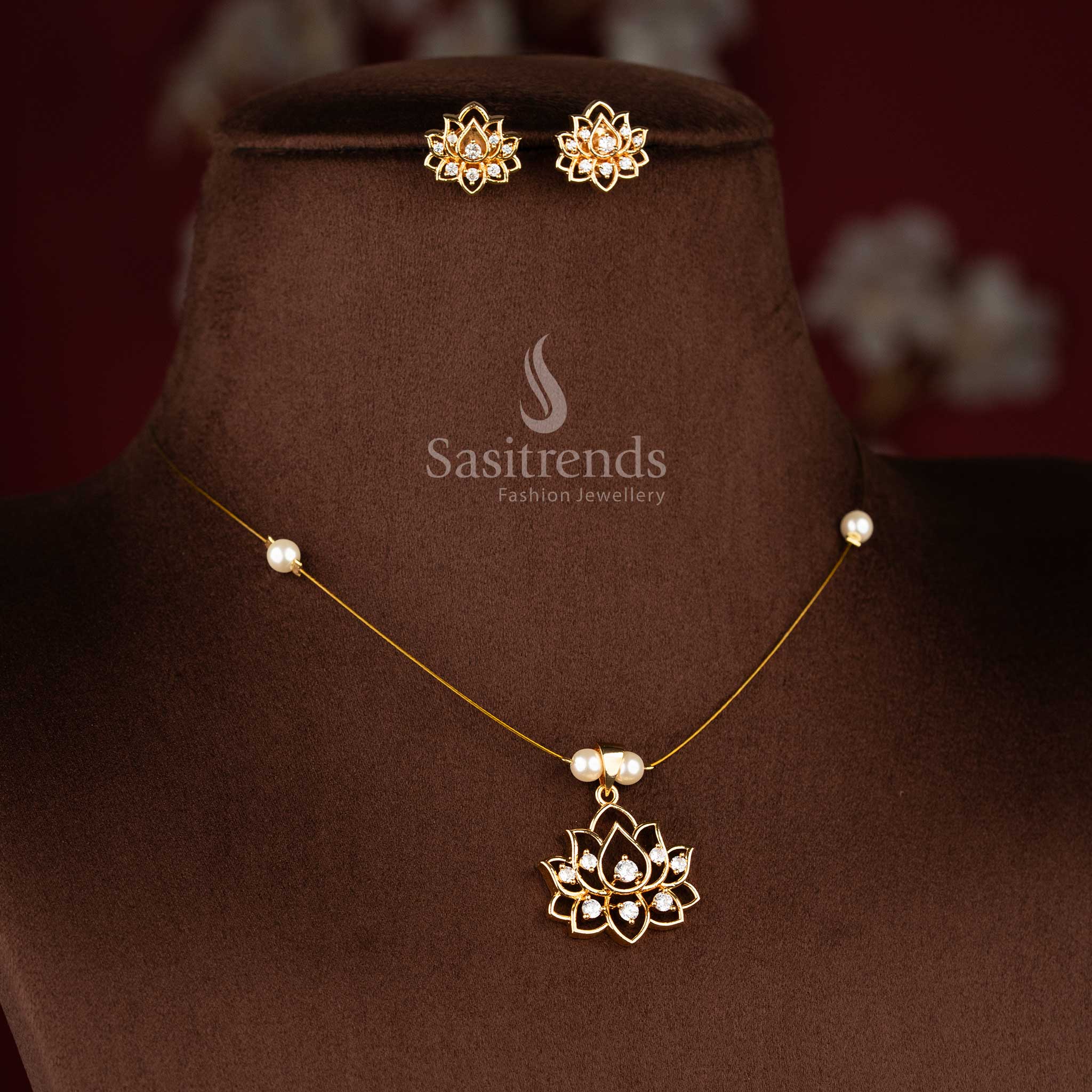 Sasitrends lotus floral invisible American diamond pendant necklace with matching lotus stud earrings pearl bead chain 24K gold plated jewellery set