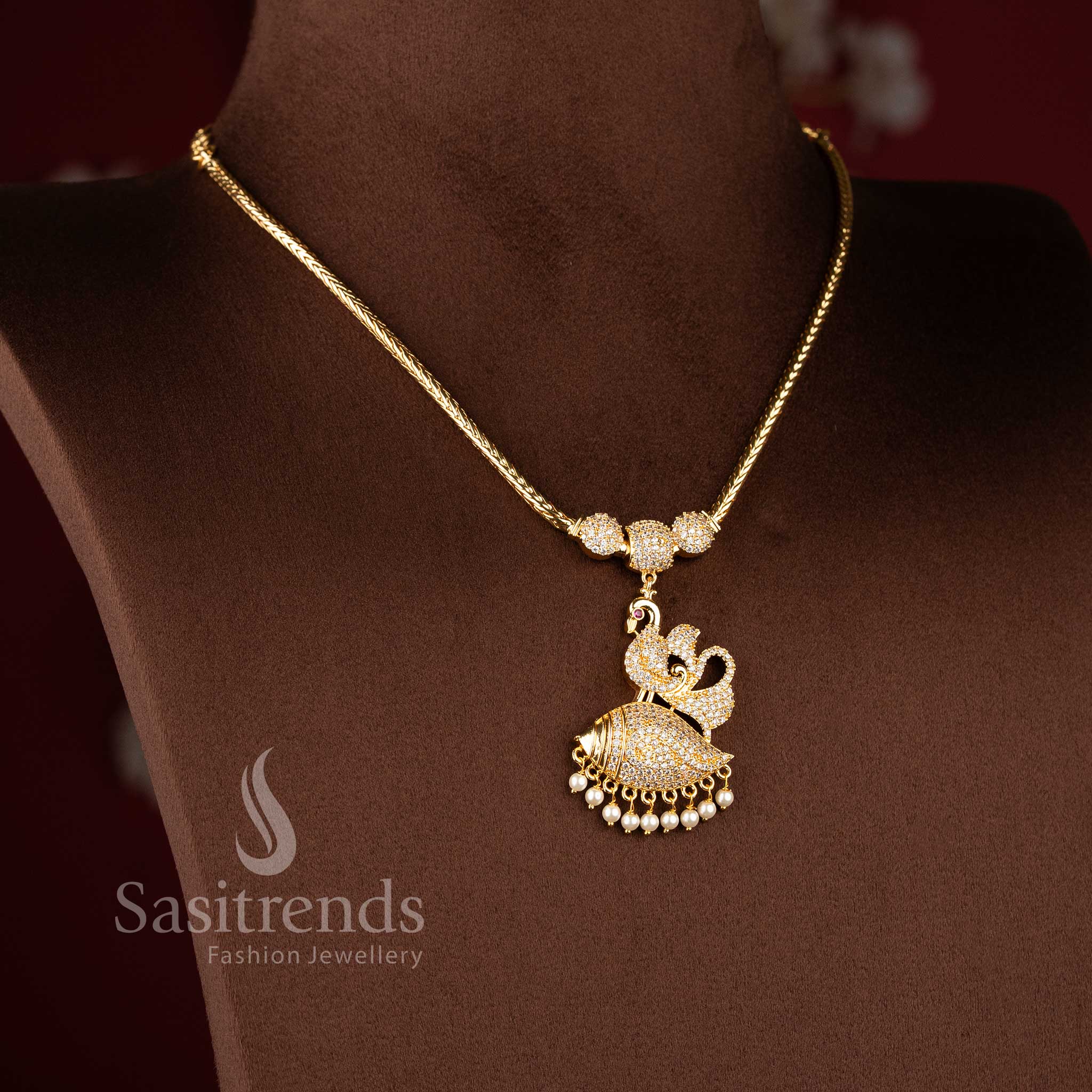 Sasitrends designer micro gold plated necklace showcasing peacock motif with layered dome design and pearl drops