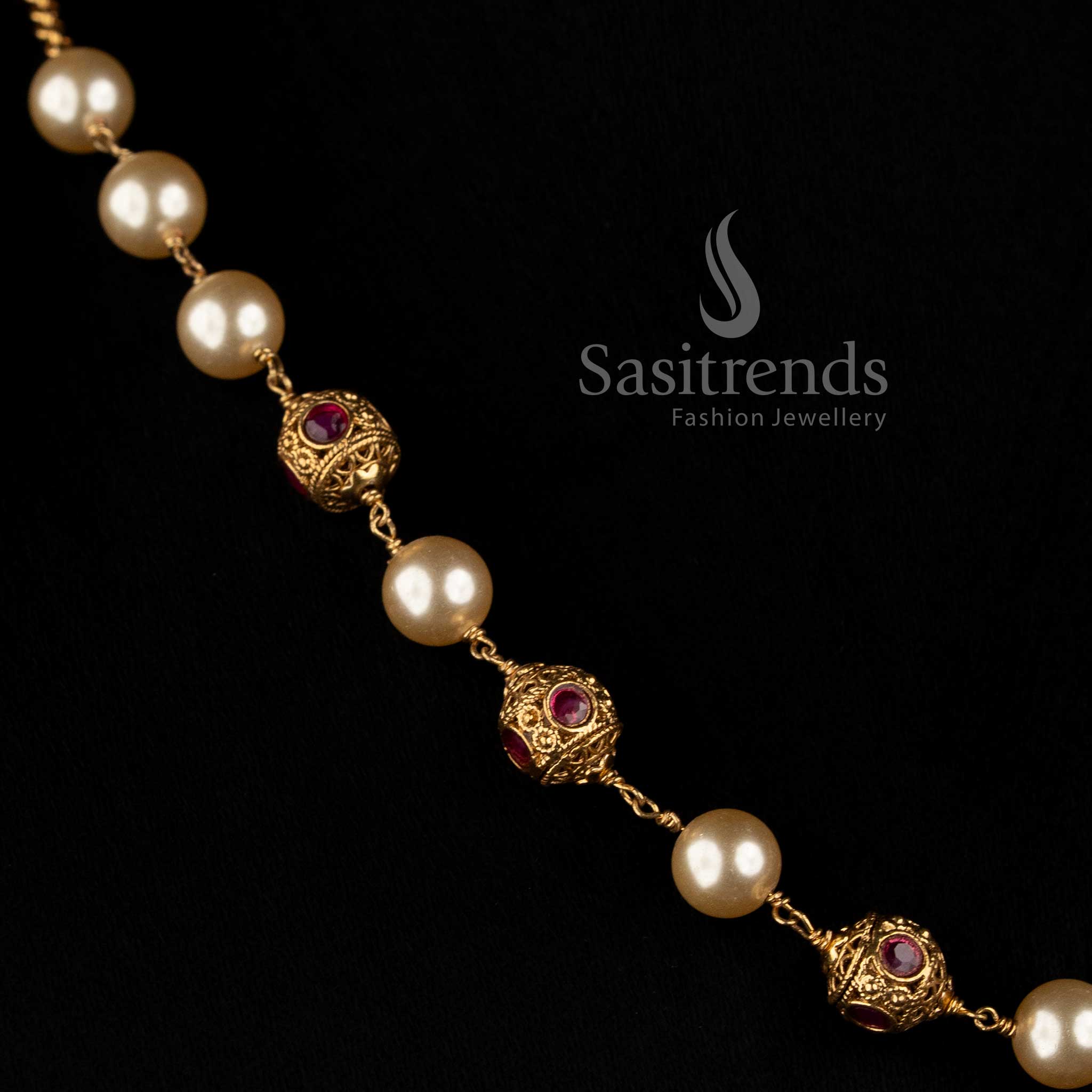 Sasitrends antique gold plated Indian pearl necklace with decorative stone motifs and traditional beadwork 