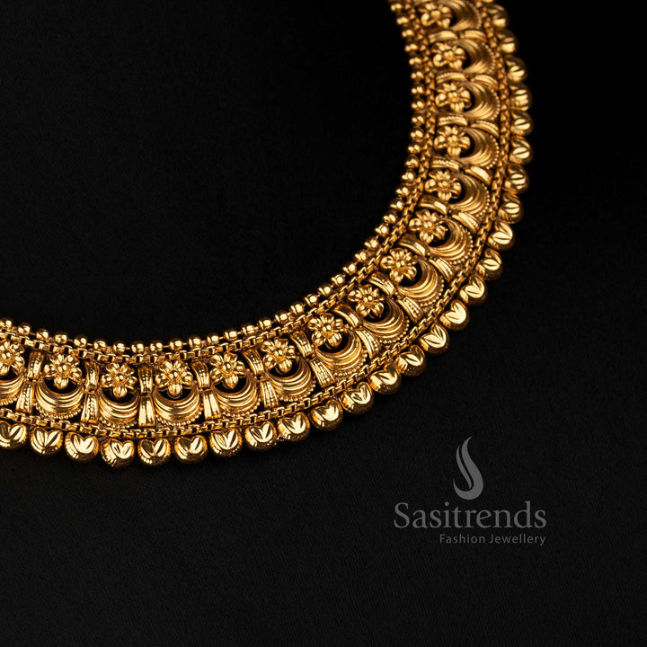 Sasitrends broad antique gold collar necklace featuring repeated curved floral scroll patterns, fine beaded borders and ornamental earrings 