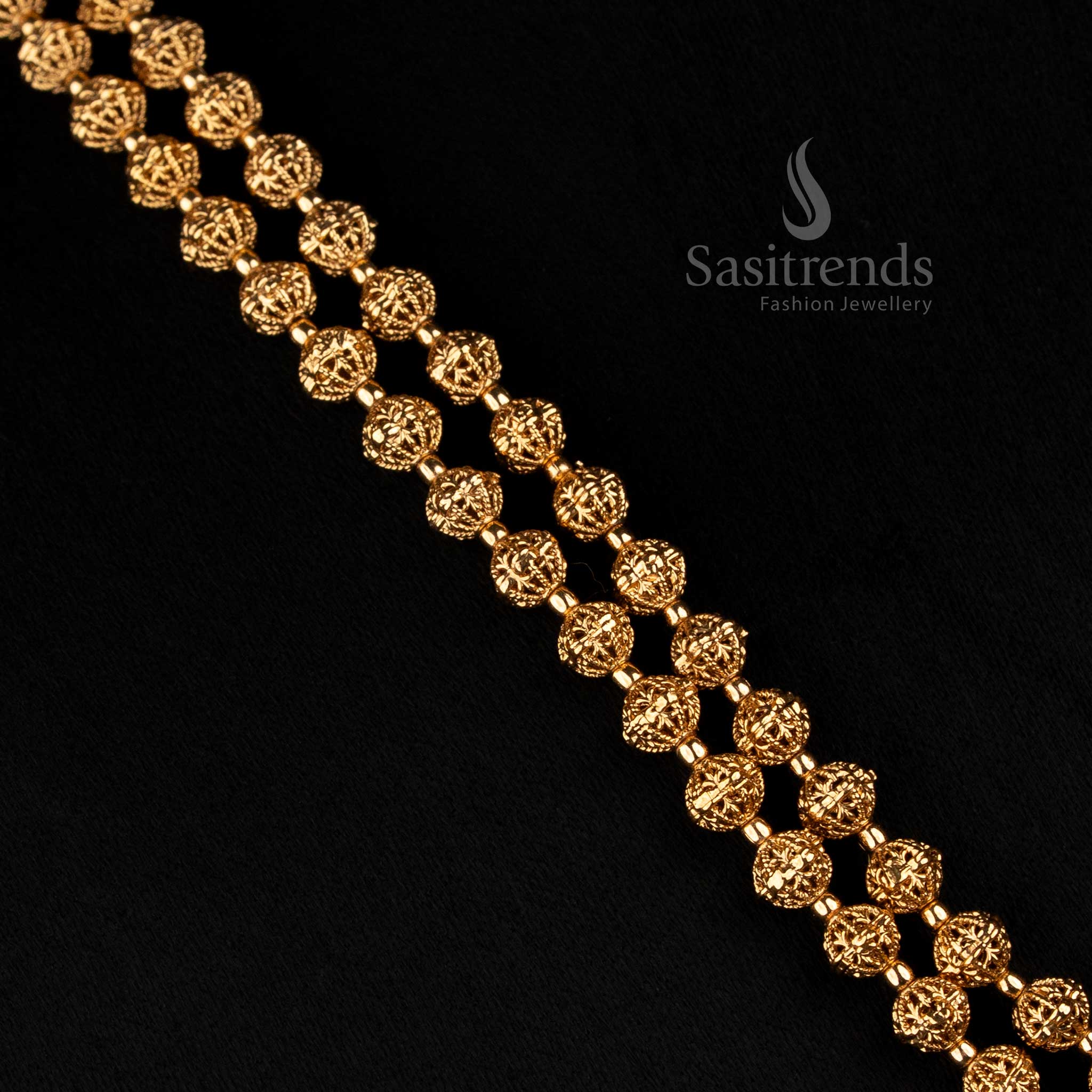 Sasitrends traditional antique gold jewellery set with layered floral bead strands, ornamental drop earrings and long ethnic necklace design 
