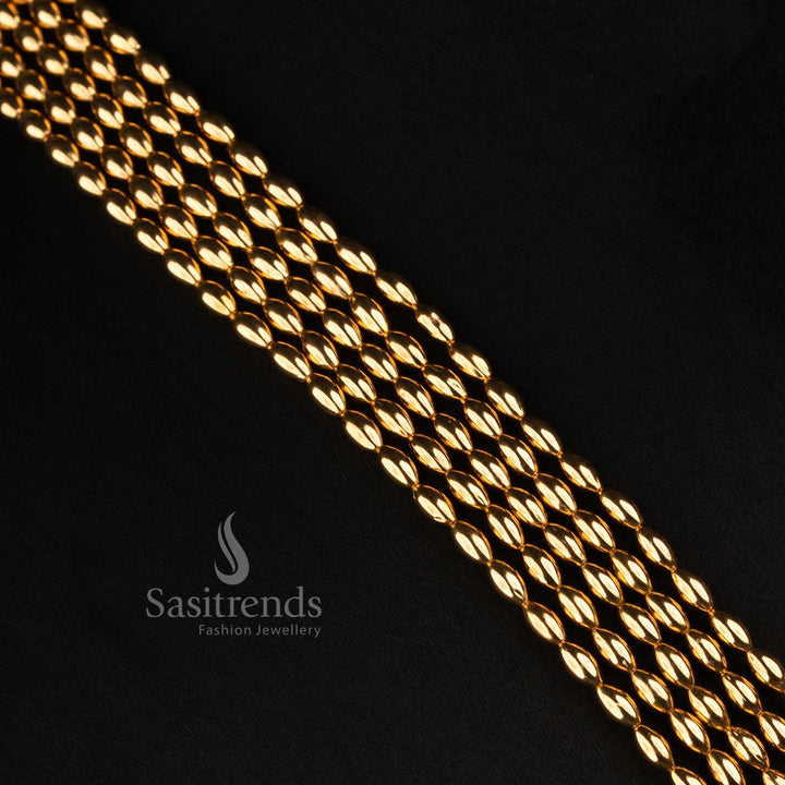 Sasitrends antique gold traditional five row necklace jewellery set with elongated layered bead structure and circular top jhumka earrings 