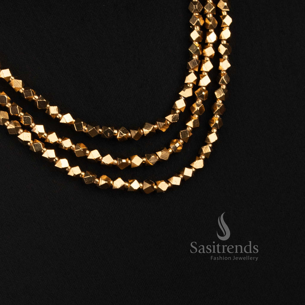 Sasitrends traditional antique gold necklace featuring three cascading rows of angular faceted beads with detailed circular earrings 
