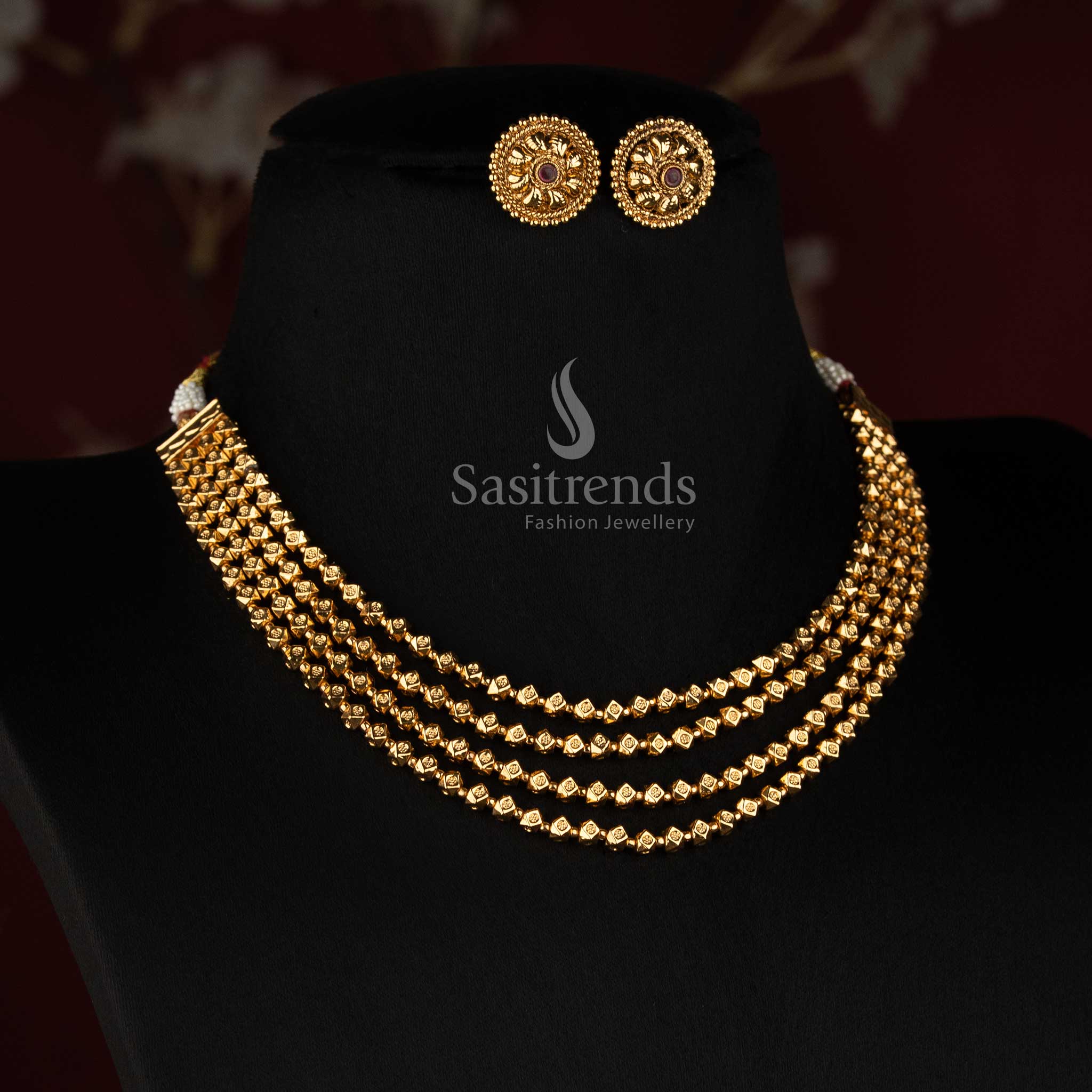 Sasitrends antique gold plated four layer faceted bead necklace set with cascading geometric bead strands and intricate floral round earrings 