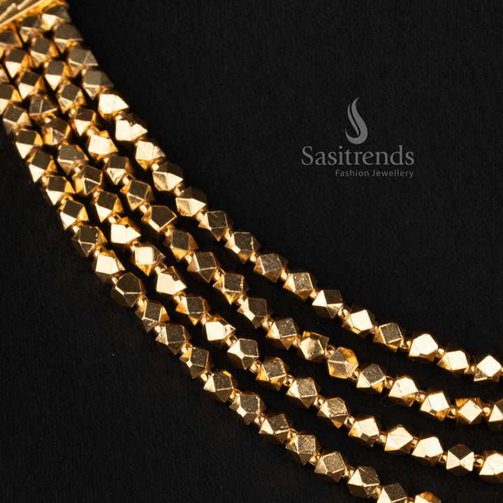 Sasitrends long traditional necklace featuring four graduated strands of closely linked geometric faceted beads with ornate dome Jhumka earrings 
