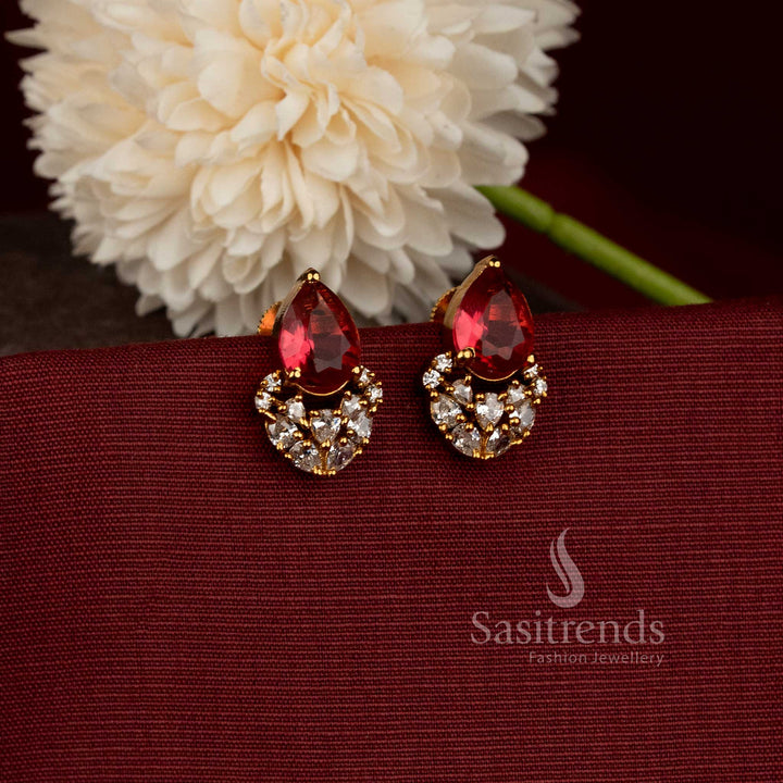 Matte Gold Plated Pear-Shaped AD Stone Stud Earrings with Curved Cluster Base - Sasitrends