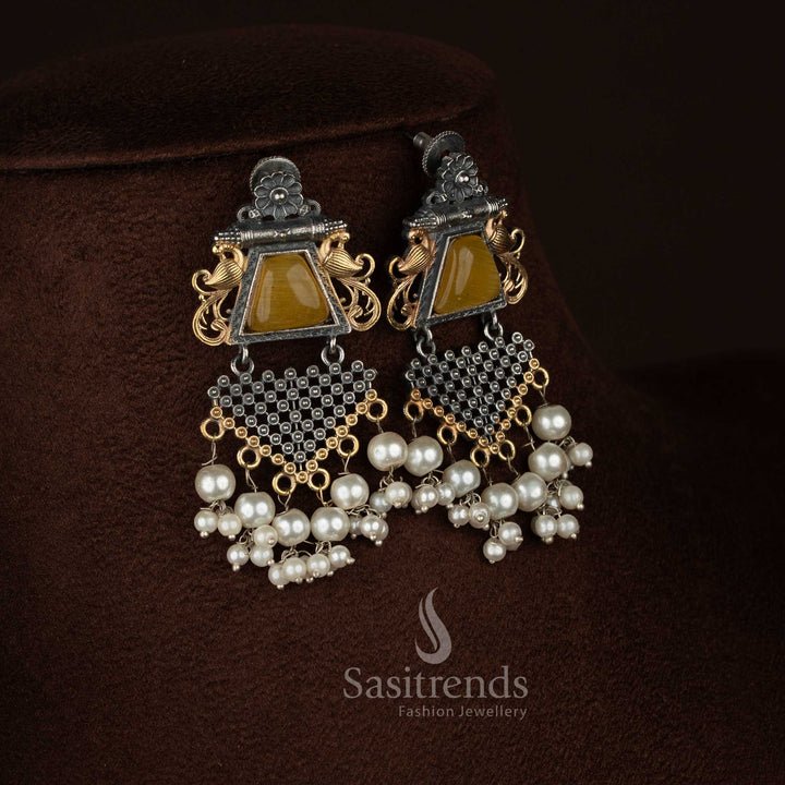 Sasitrends 92.5 silver plated antique oxidised necklace set designed with a detailed floral framework surrounding a peacock motif pendant, highlighted Monalisa stone setting, delicate pearl accents, textured oxidised finish, matching earrings, and traditional ethnic jewellery aesthetics.