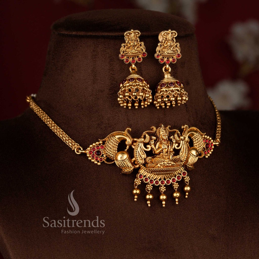 Sasitrends traditional temple matte gold plated ruby stone jewellery set choker featuring detailed Lakshmi idol carving and bead danglers