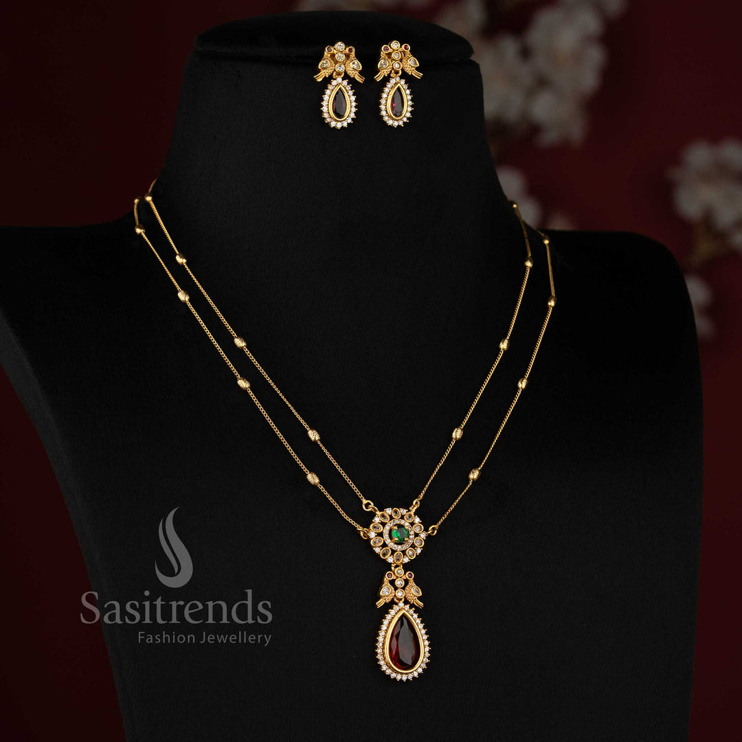 Elegant American diamond matte gold two line chain necklace set in ruby green with dual layer design for women, perfect for festive and traditional wear – Sasitrends