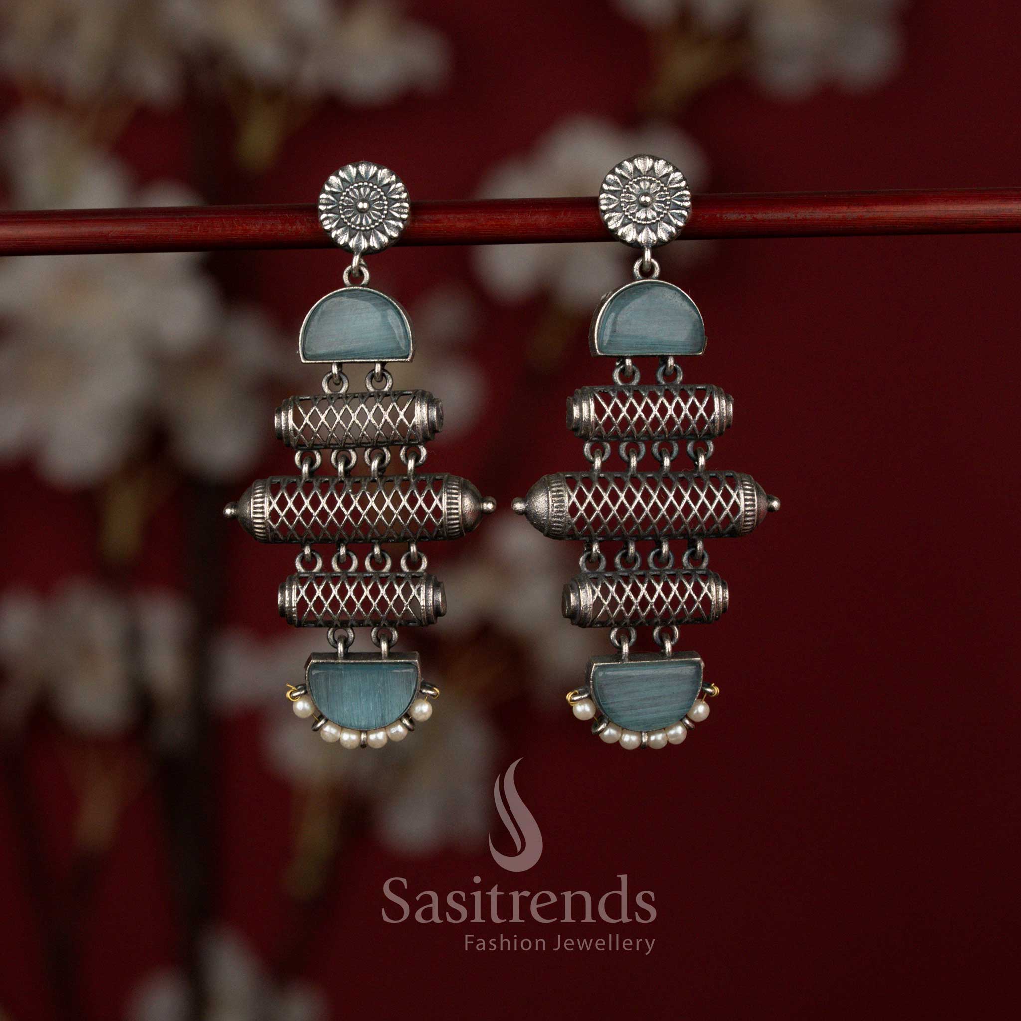 Sasitrends antique finish multi-tier barrel structure earrings crafted with intricate surface textures, embedded teal blue stone panels and graceful pearl drop detailing for festive and cultural occasions.