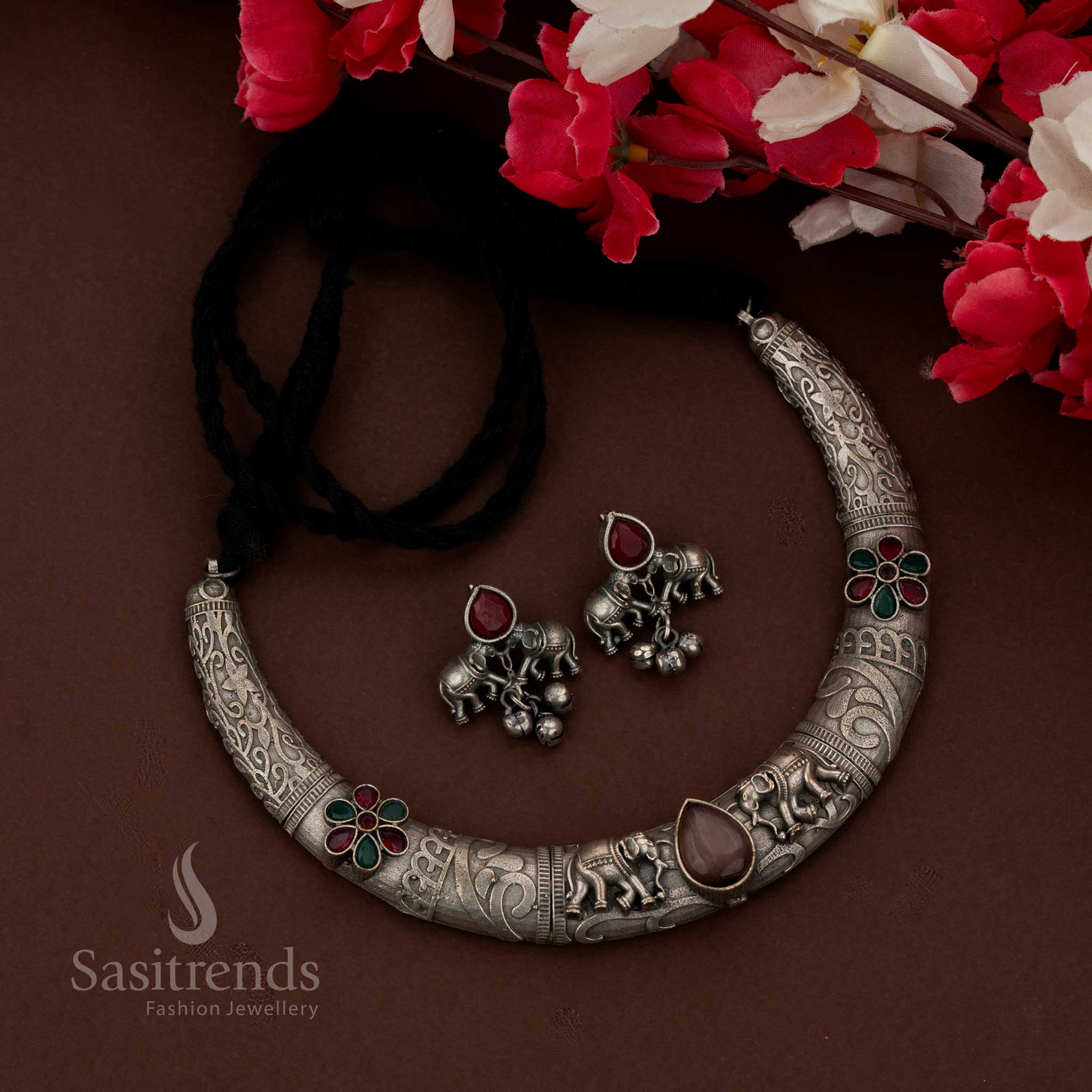 Sasitrends antique finish oxidised brown necklace set crafted with elephant motif detailing in bold husli design for celebration wear