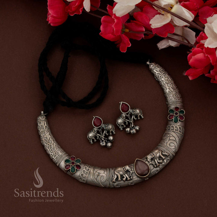 Sasitrends antique finish oxidised brown necklace set crafted with elephant motif detailing in bold husli design for celebration wear