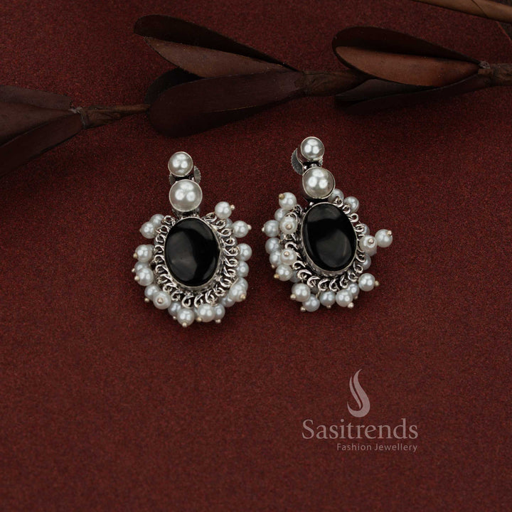 Sasitrends antique finish oxidised silver stud earrings designed with double pearl top and oval clustered black stone structure