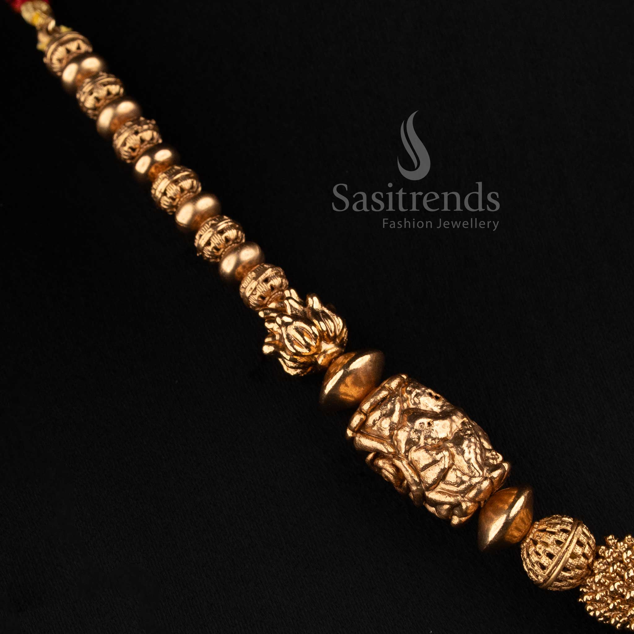 Sasitrends antique gold Lakshmi barrel bead and textured golden strand mala necklace set with floral stud earrings