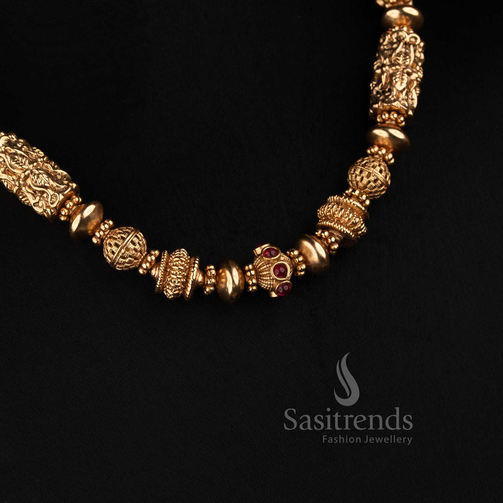 Sasitrends antique gold Lakshmi cylinder and filigree ball strand mala necklace set with ruby accents and matching studs